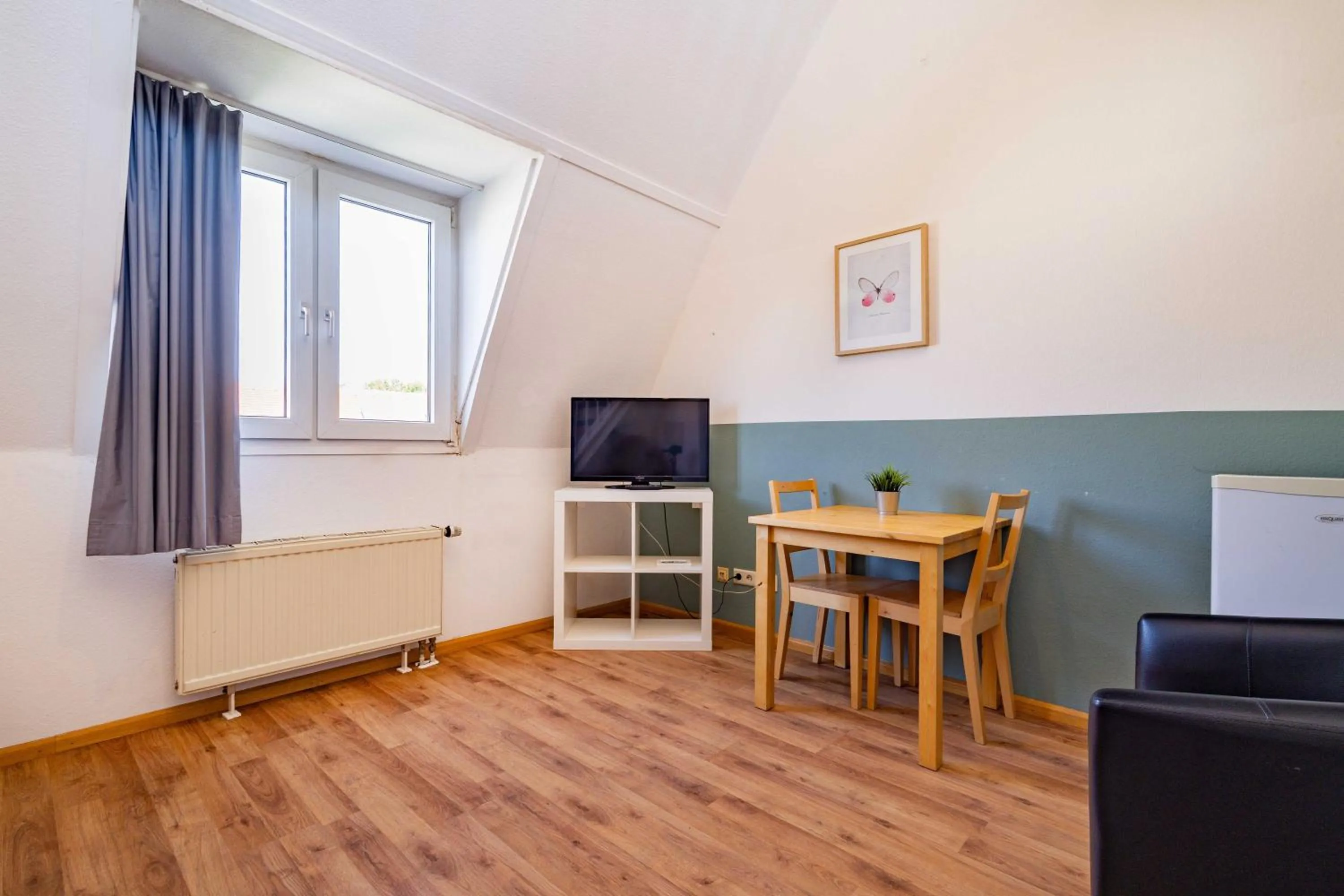 TV and multimedia in StayInn Hostel und Gästehaus