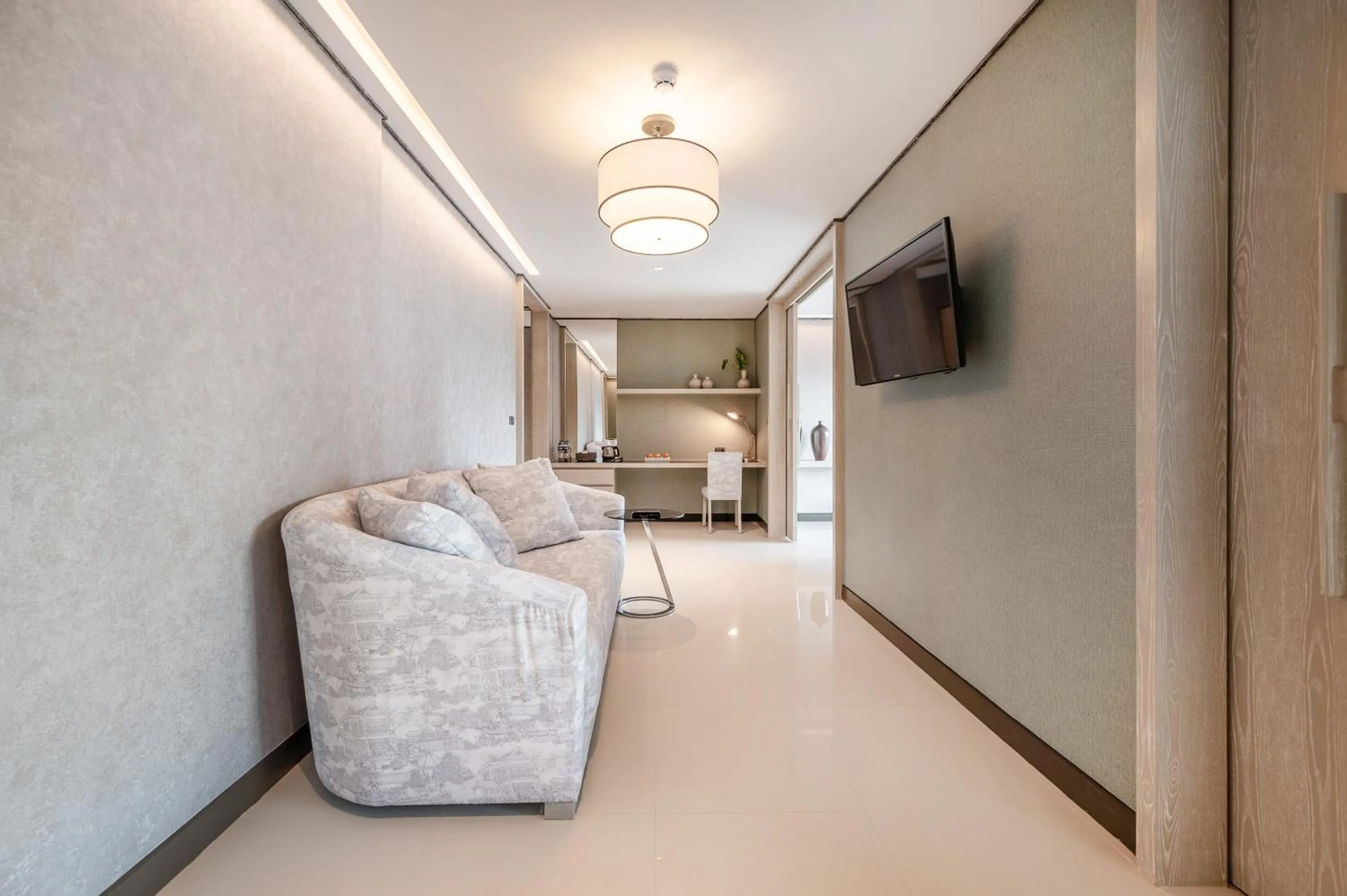 Living room in Manhattan Pattaya Hotel - SHA Extra Plus