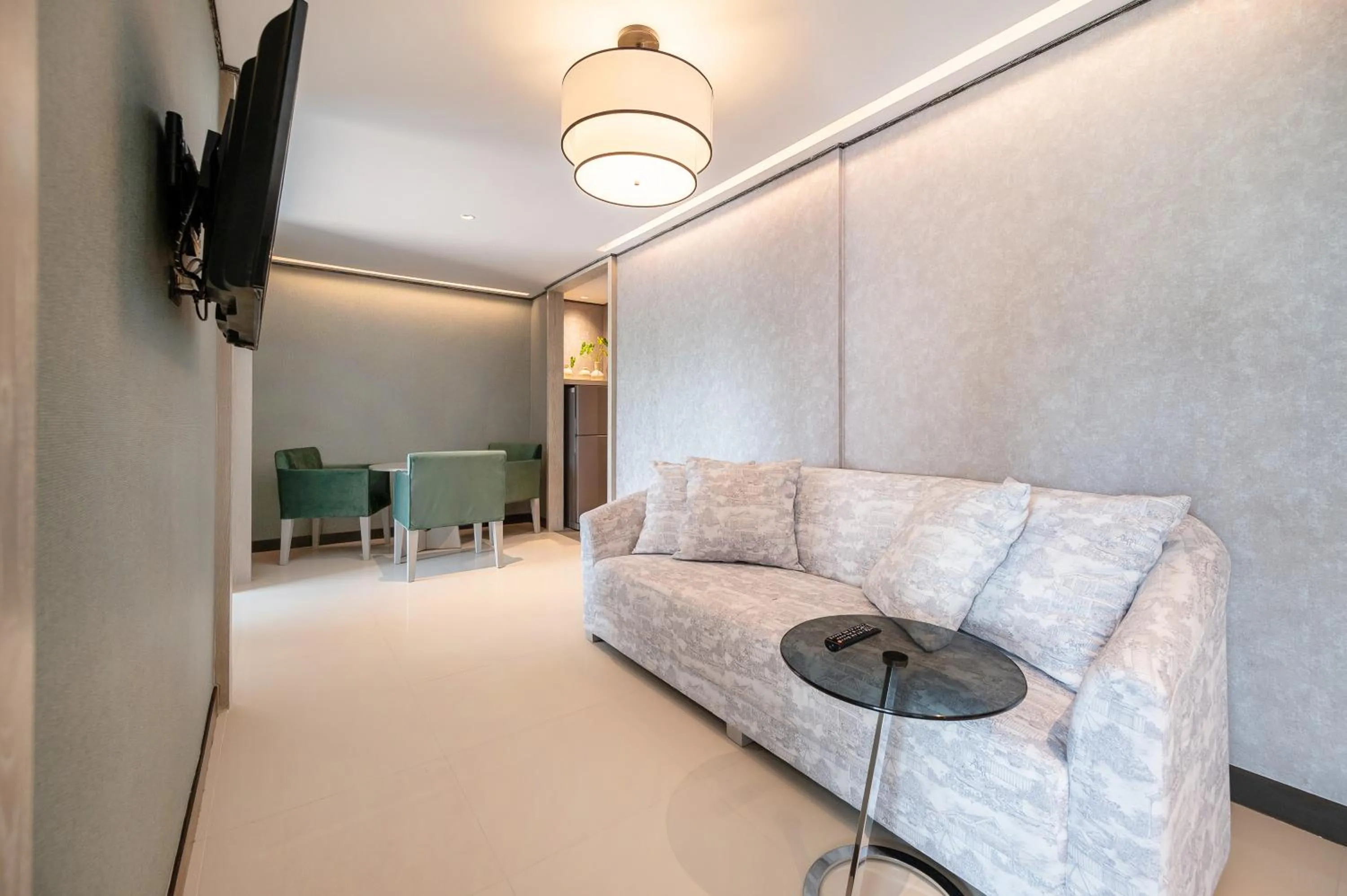 Living room in Manhattan Pattaya Hotel - SHA Extra Plus