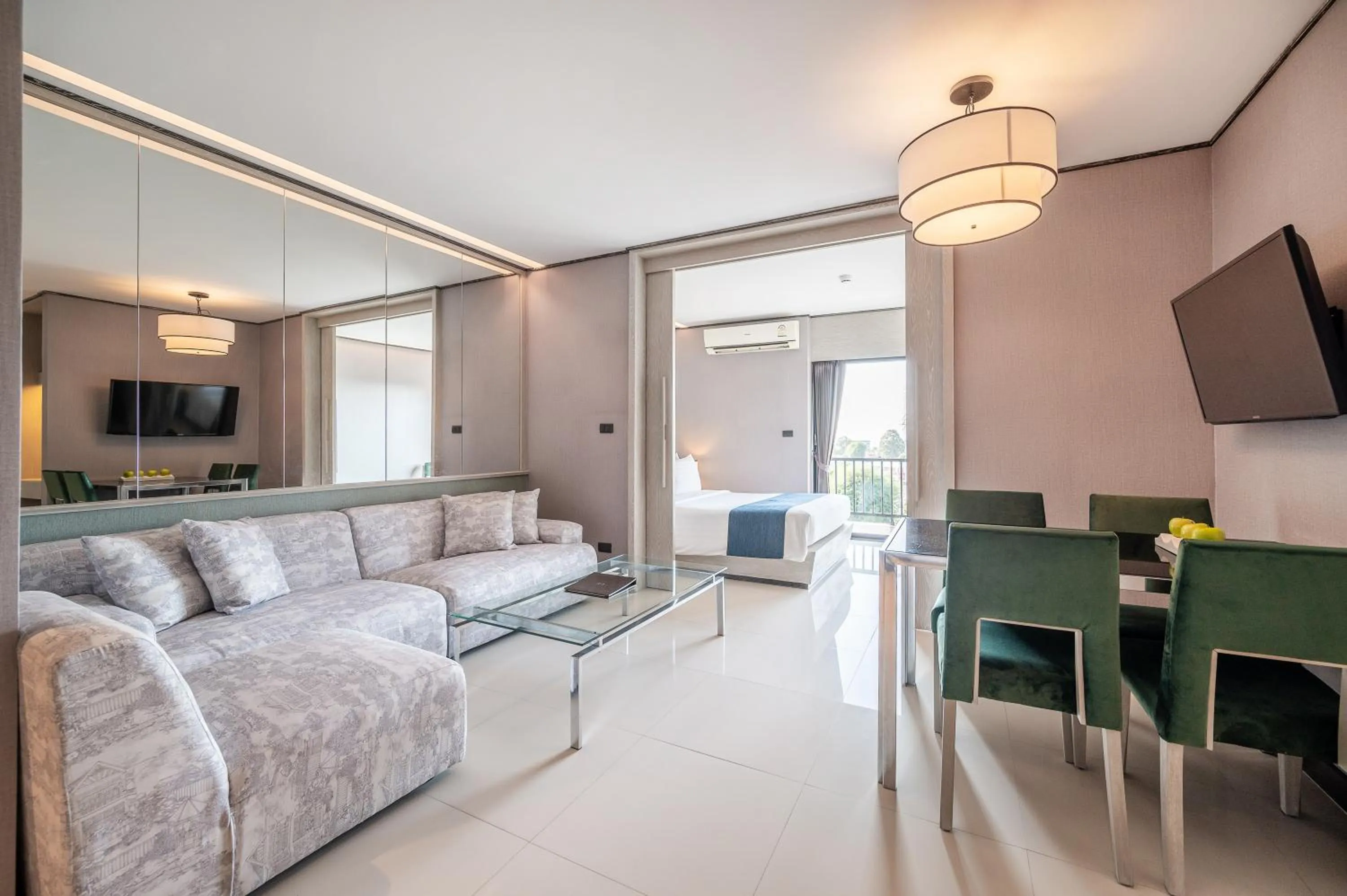 Living room, Bed in Manhattan Pattaya Hotel - SHA Extra Plus