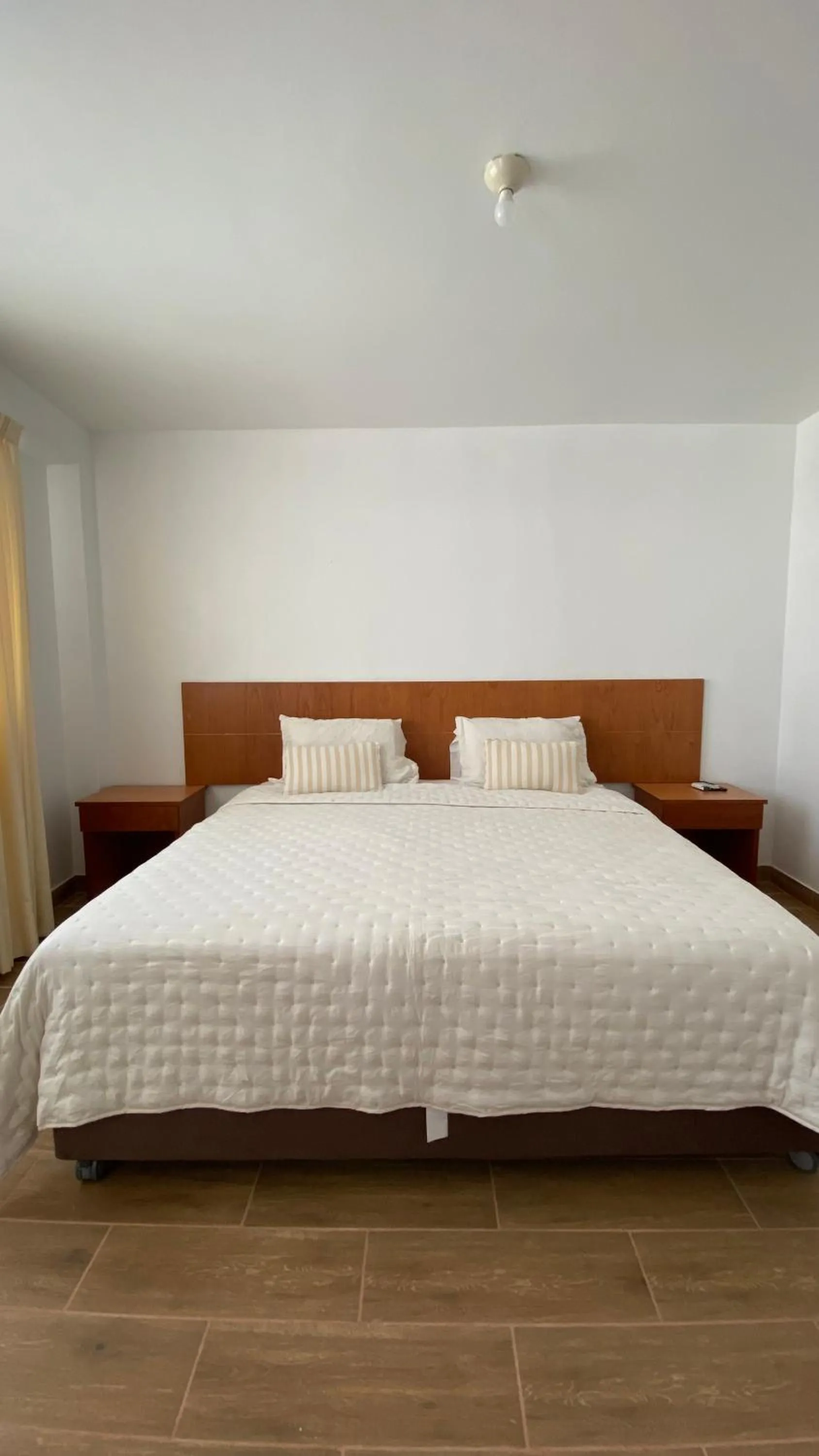 Bed in Prim Hotel Vichayito