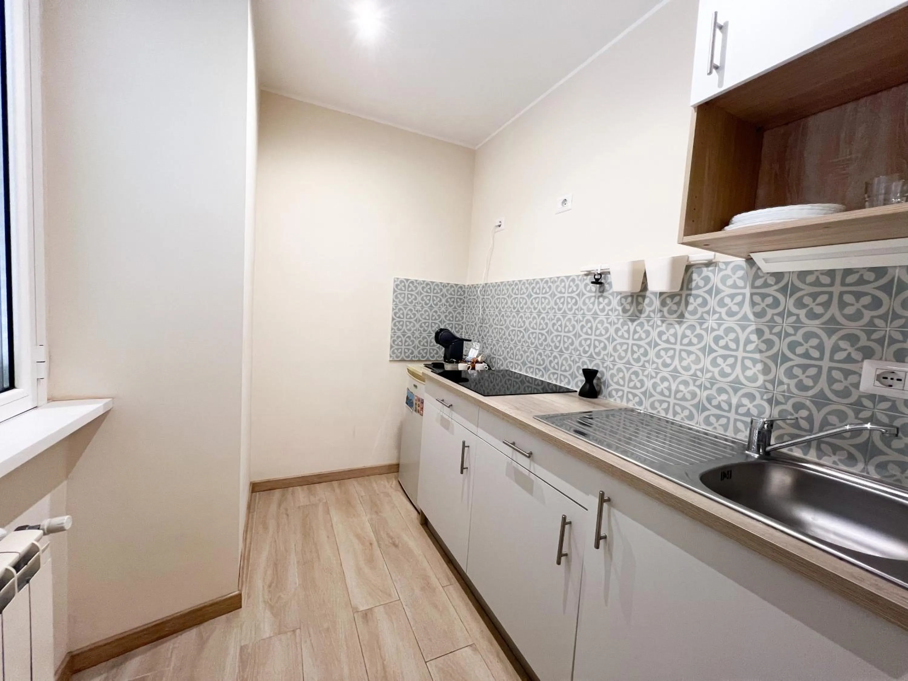 Kitchen or kitchenette in Booking House Rome