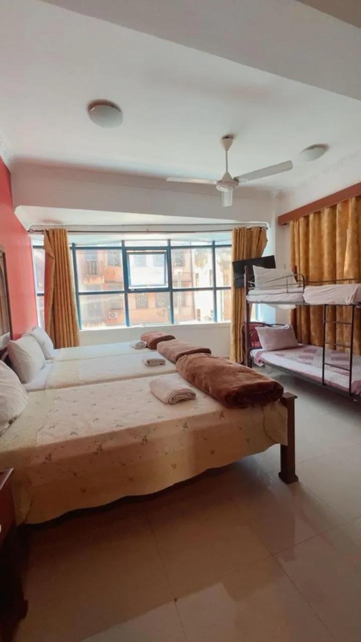 Bed in Rainbow Hotel