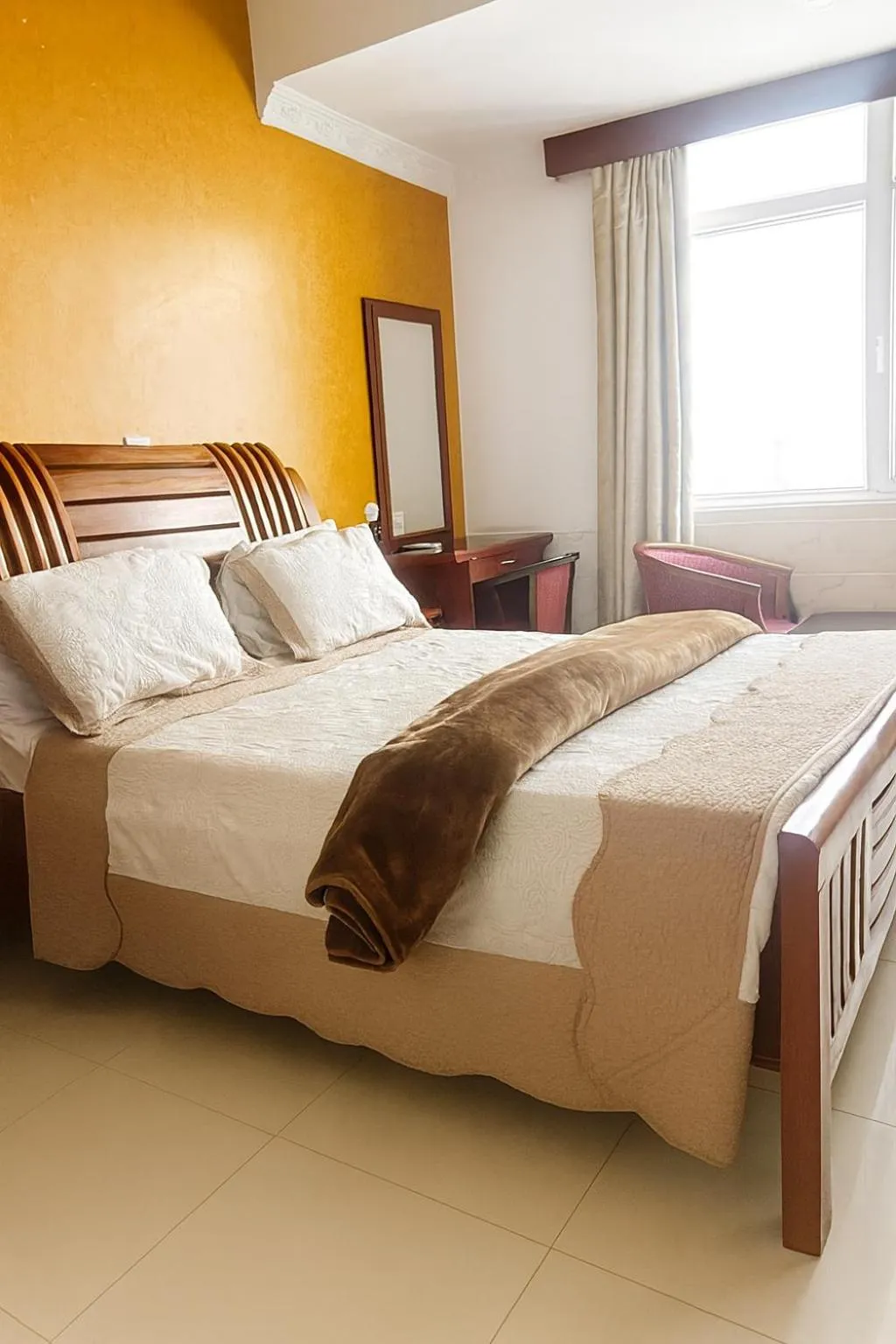 Bed in Rainbow Hotel