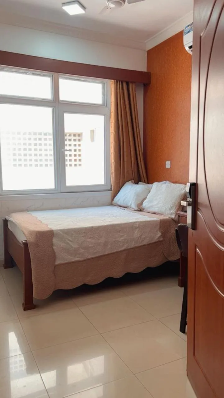 Bed in Rainbow Hotel