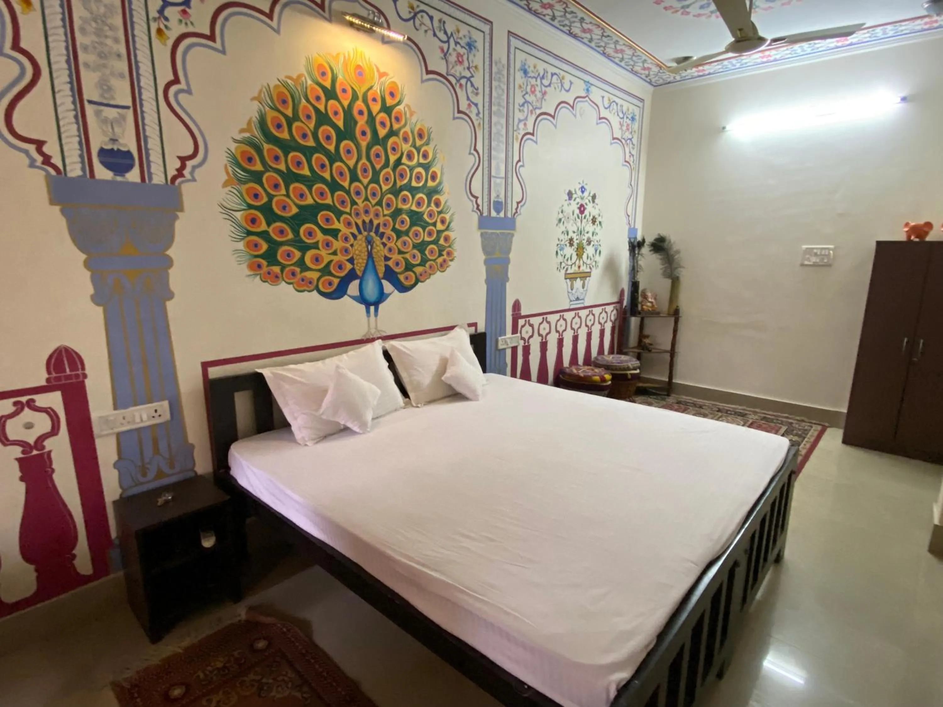 Photo of the whole room, Bed in Golden Peacock Heritage Home Stay