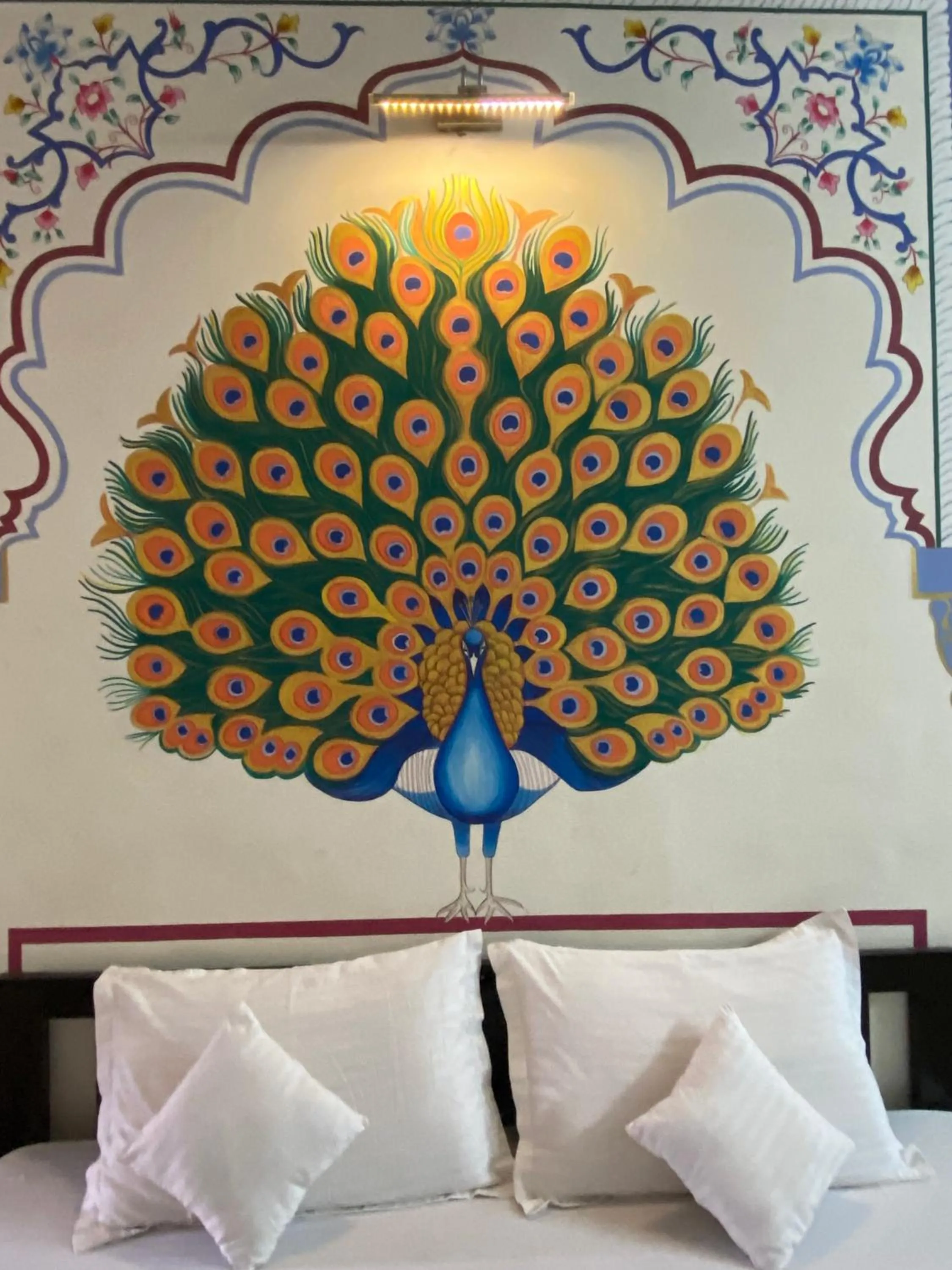 Bed in Golden Peacock Heritage Home Stay