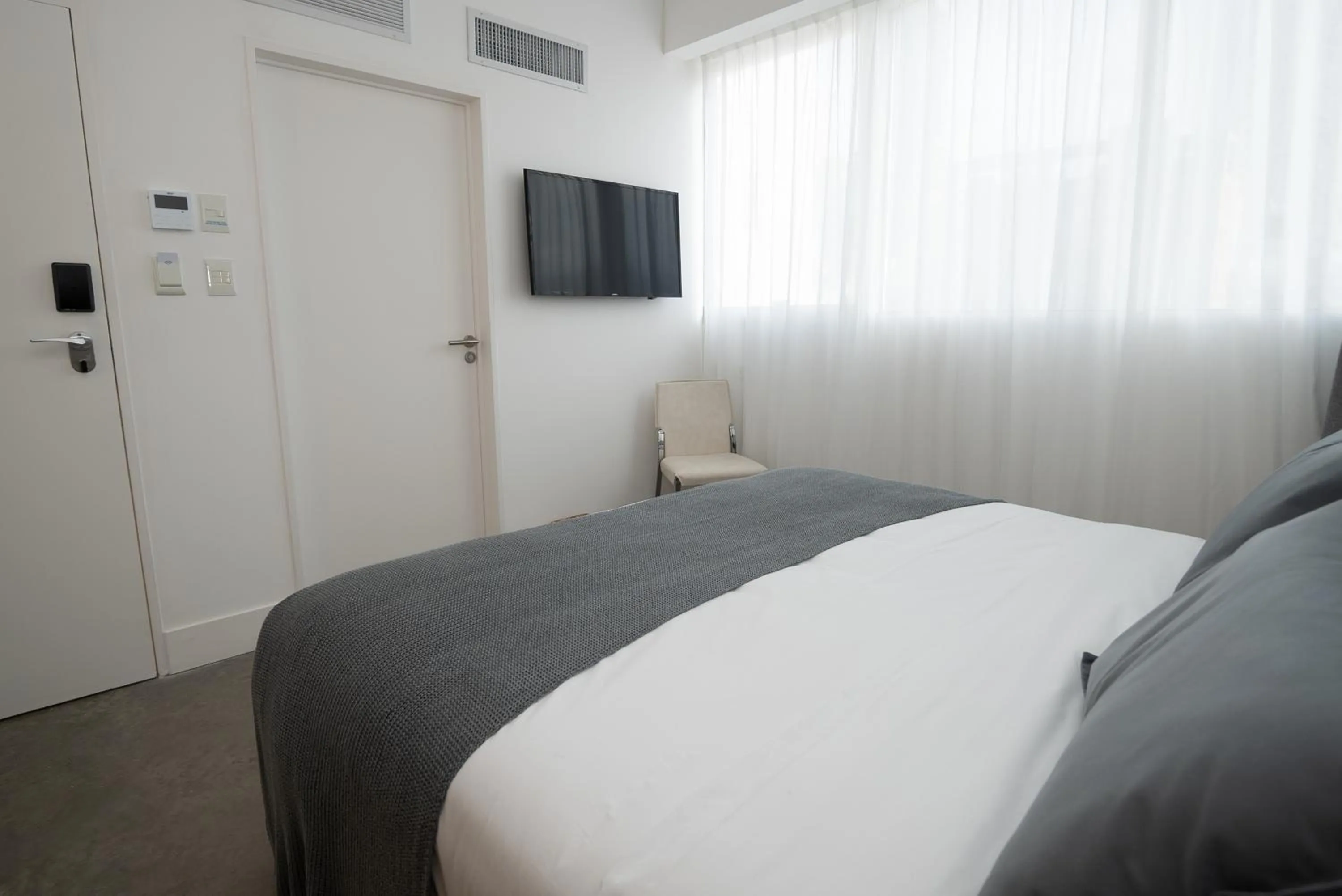 Bed in Vain Boutique Hotel