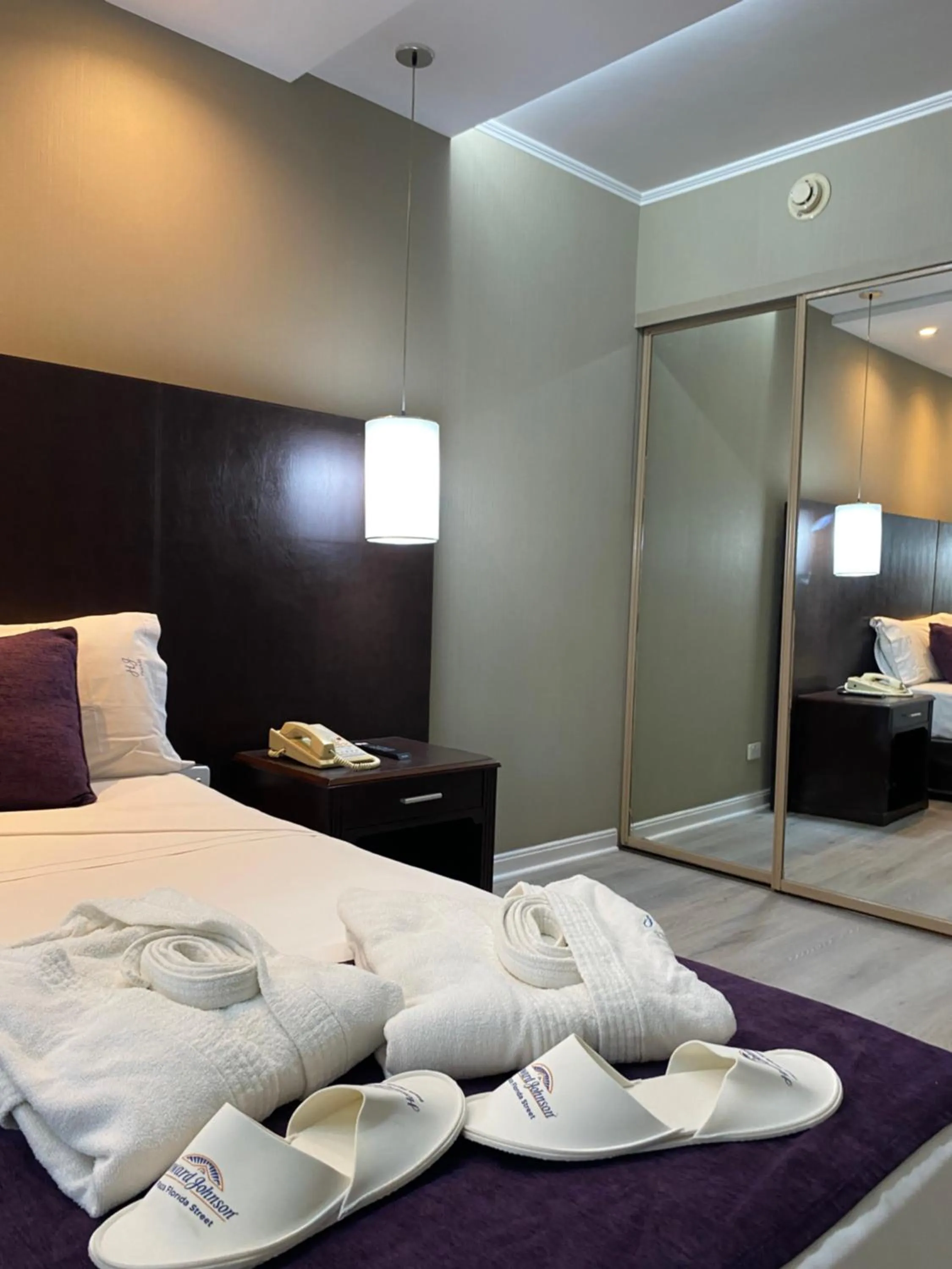 towels, Bed in Howard Johnson Plaza by Wyndham Buenos Aires Florida Street