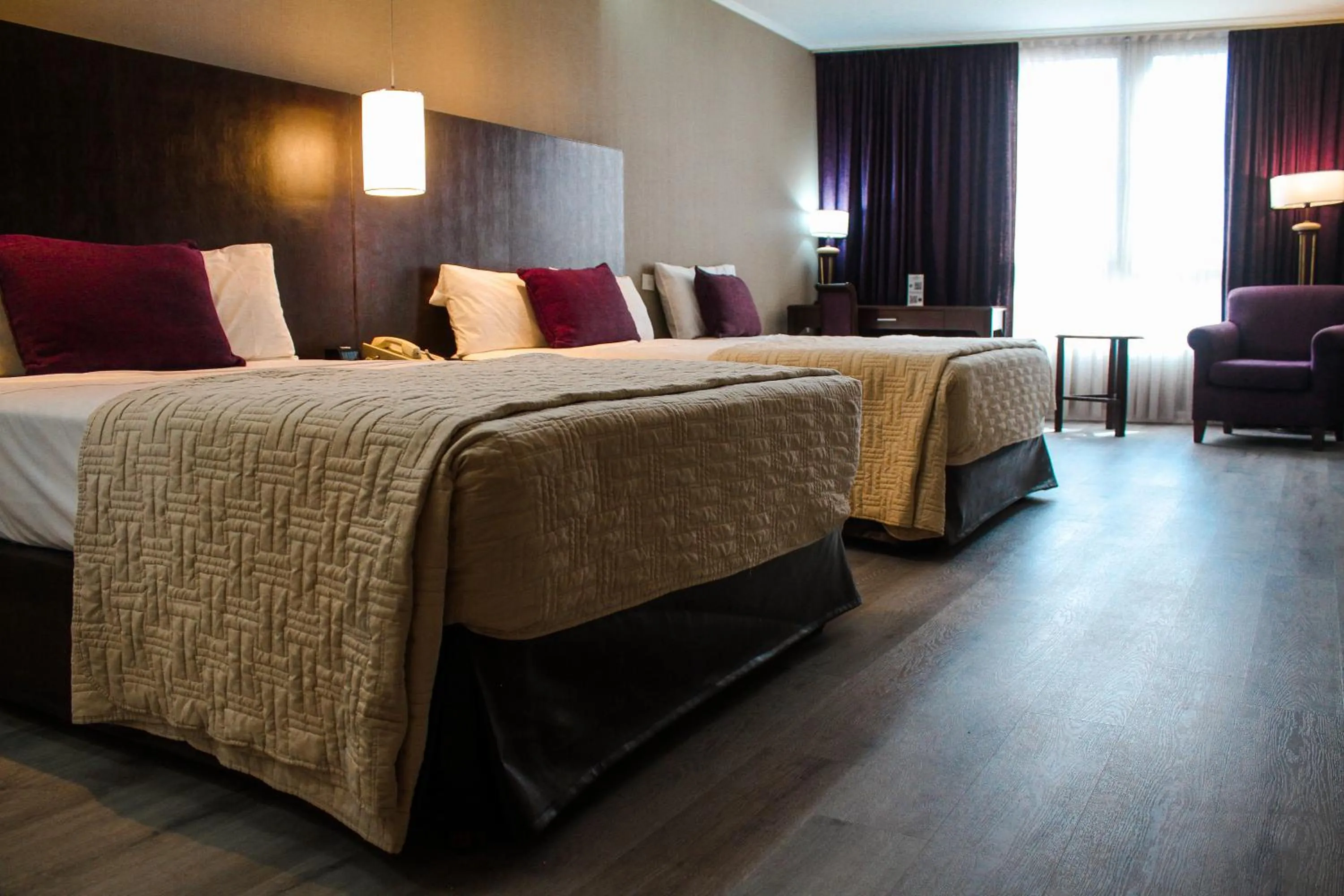 Bed in Howard Johnson Plaza by Wyndham Buenos Aires Florida Street