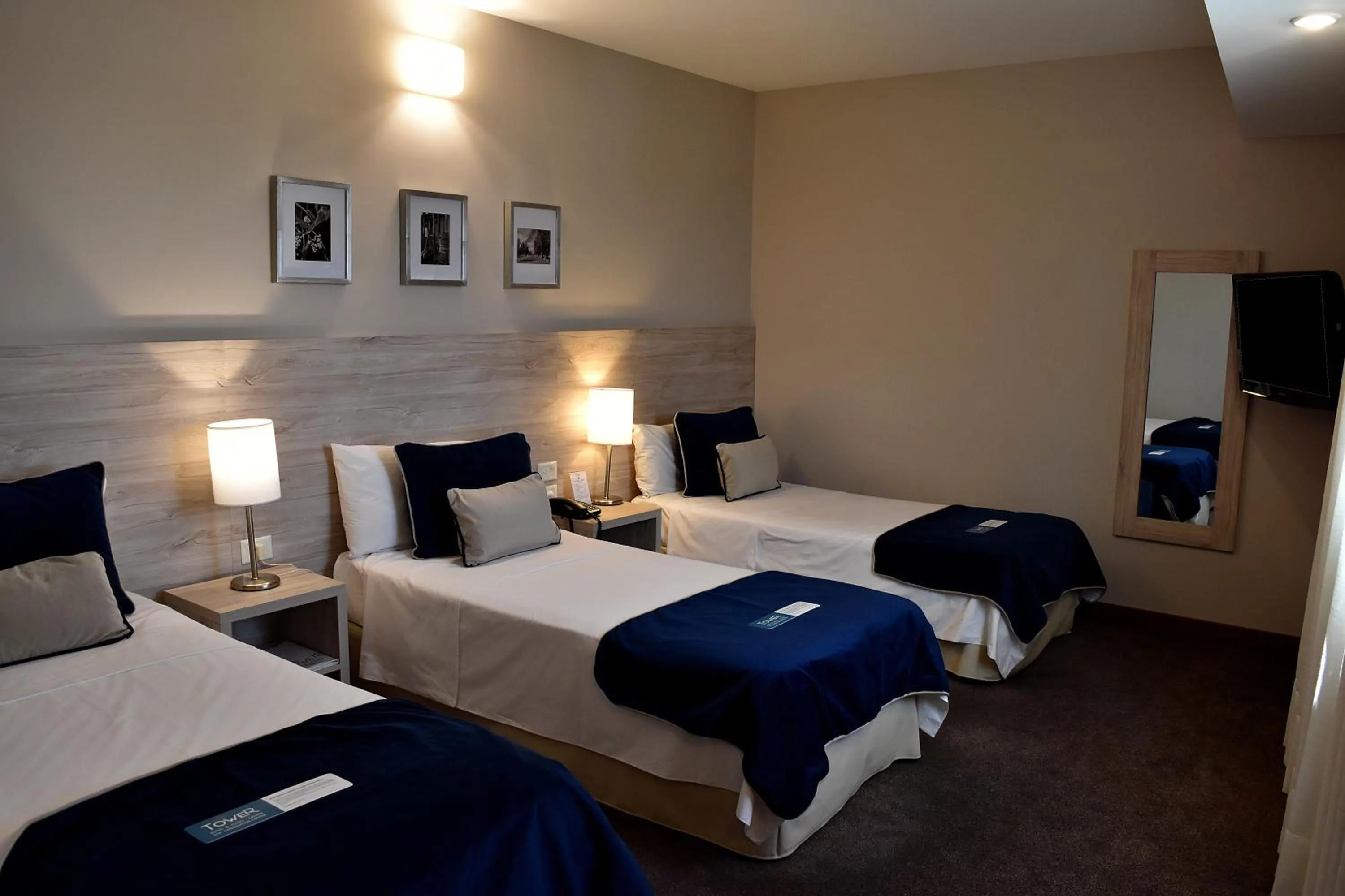 Bed in Hotel Tower Inn & Suites