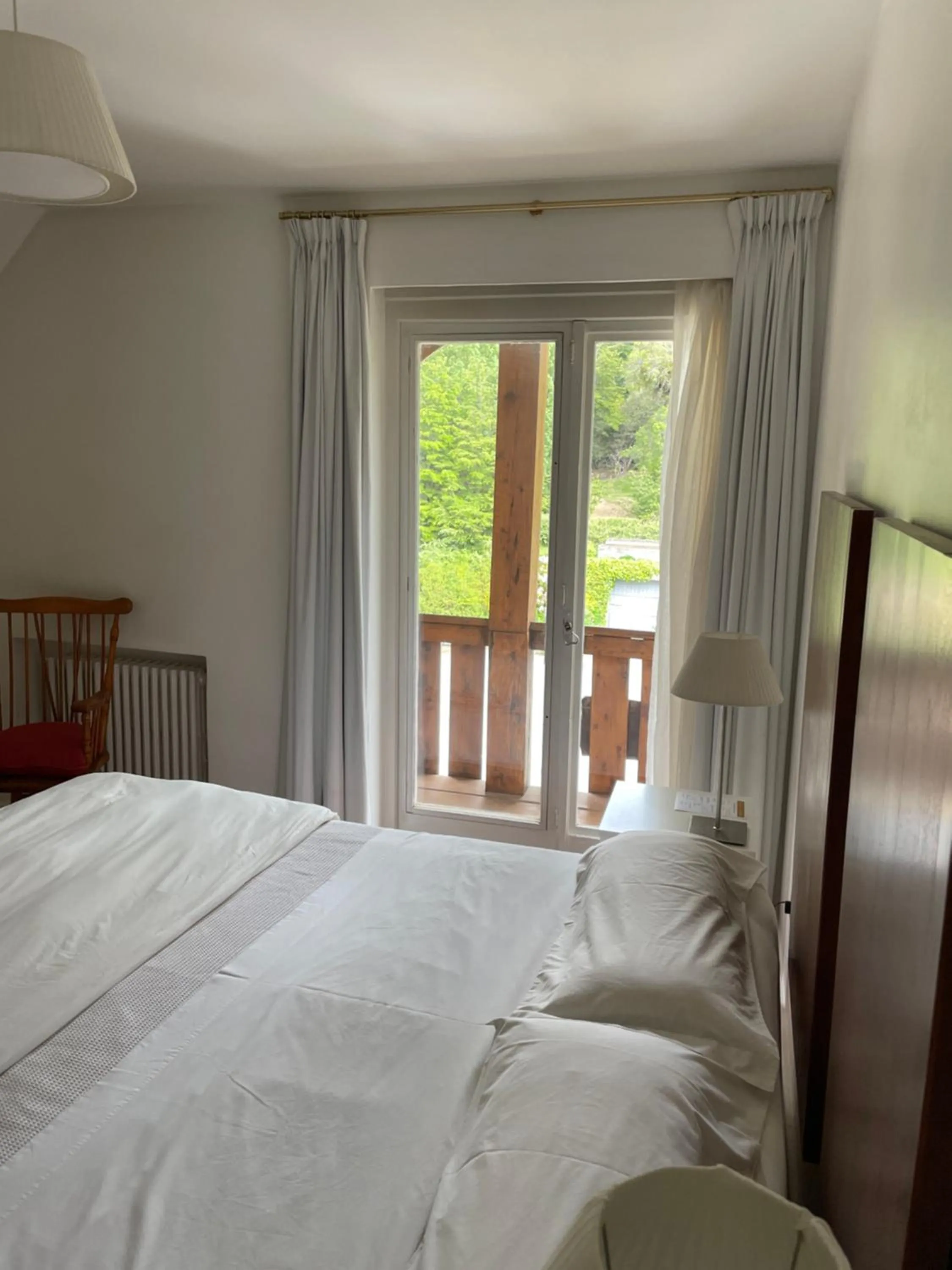 Garden view, Bed in Hotel Tunquelén