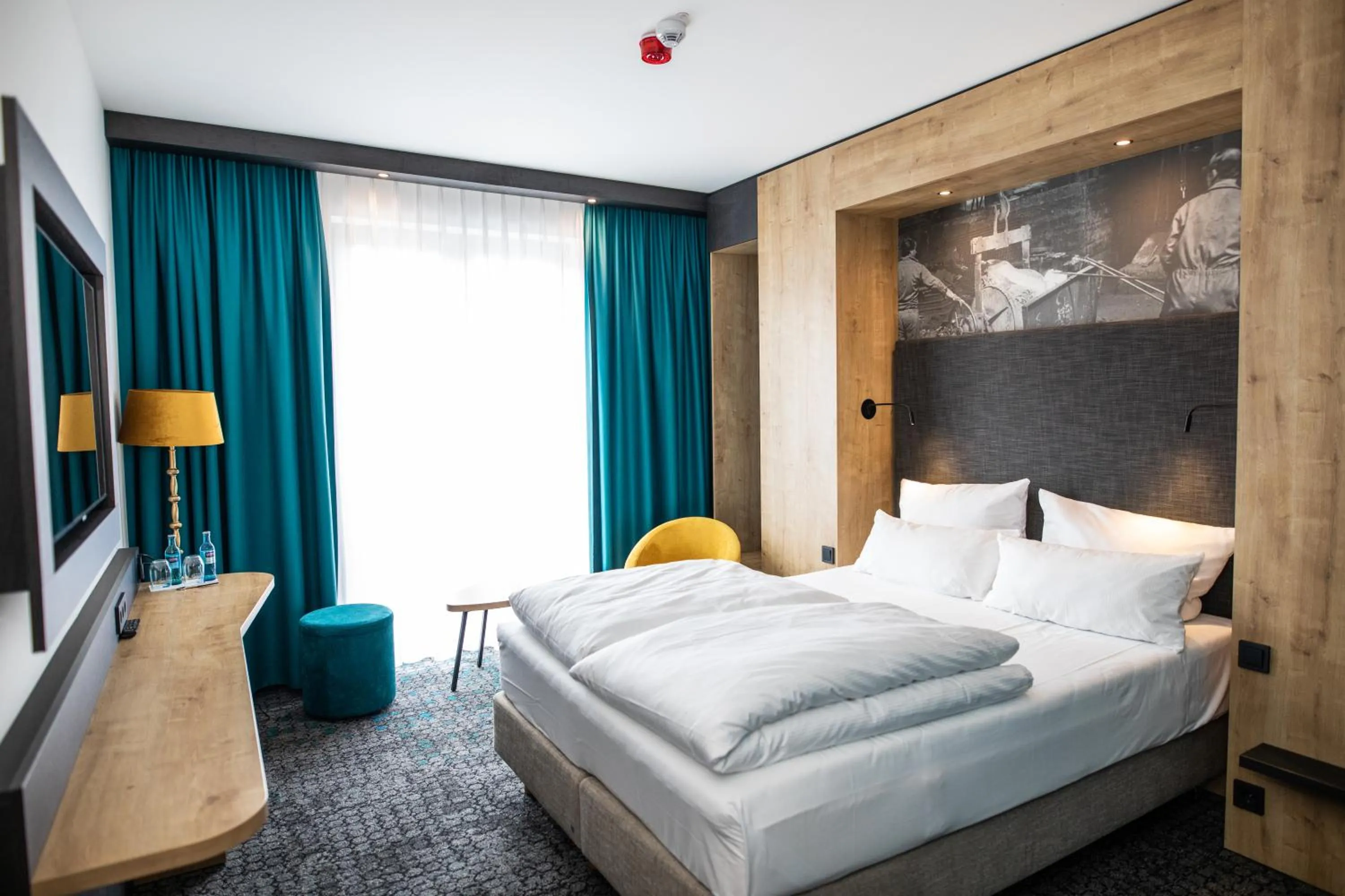 Bed in Das Steinmüller Hotel