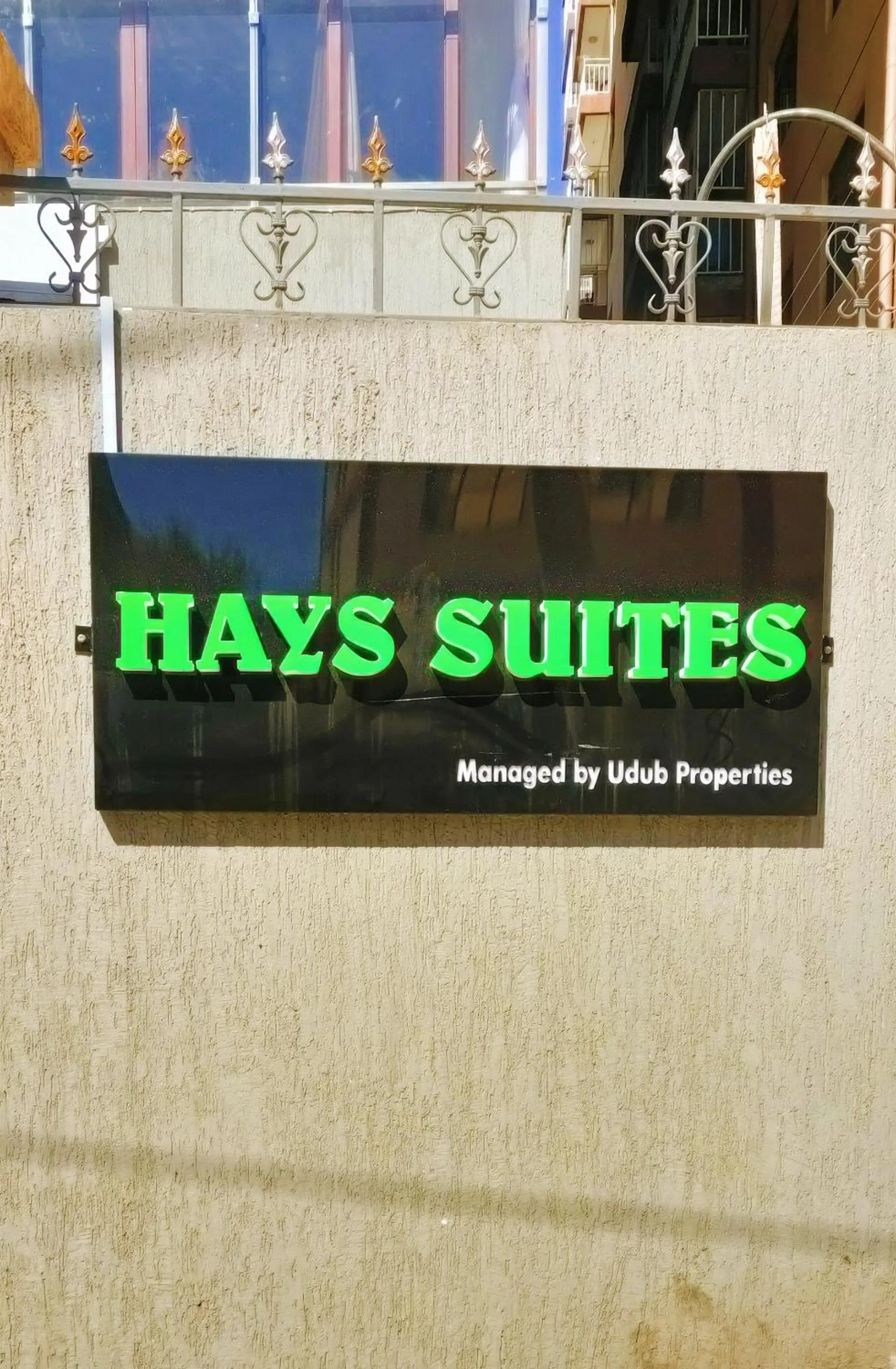 Property logo or sign in Hays Suites Hotel