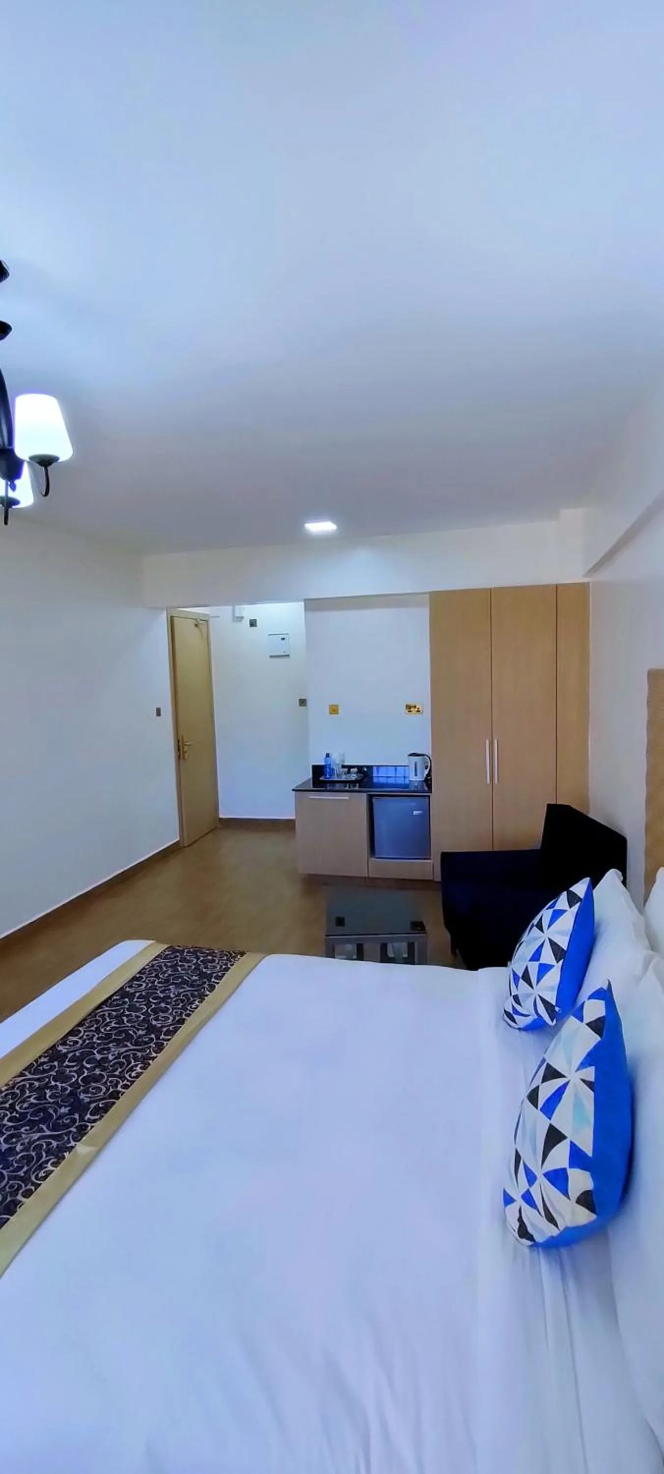 Photo of the whole room, Bed in Hays Suites Hotel