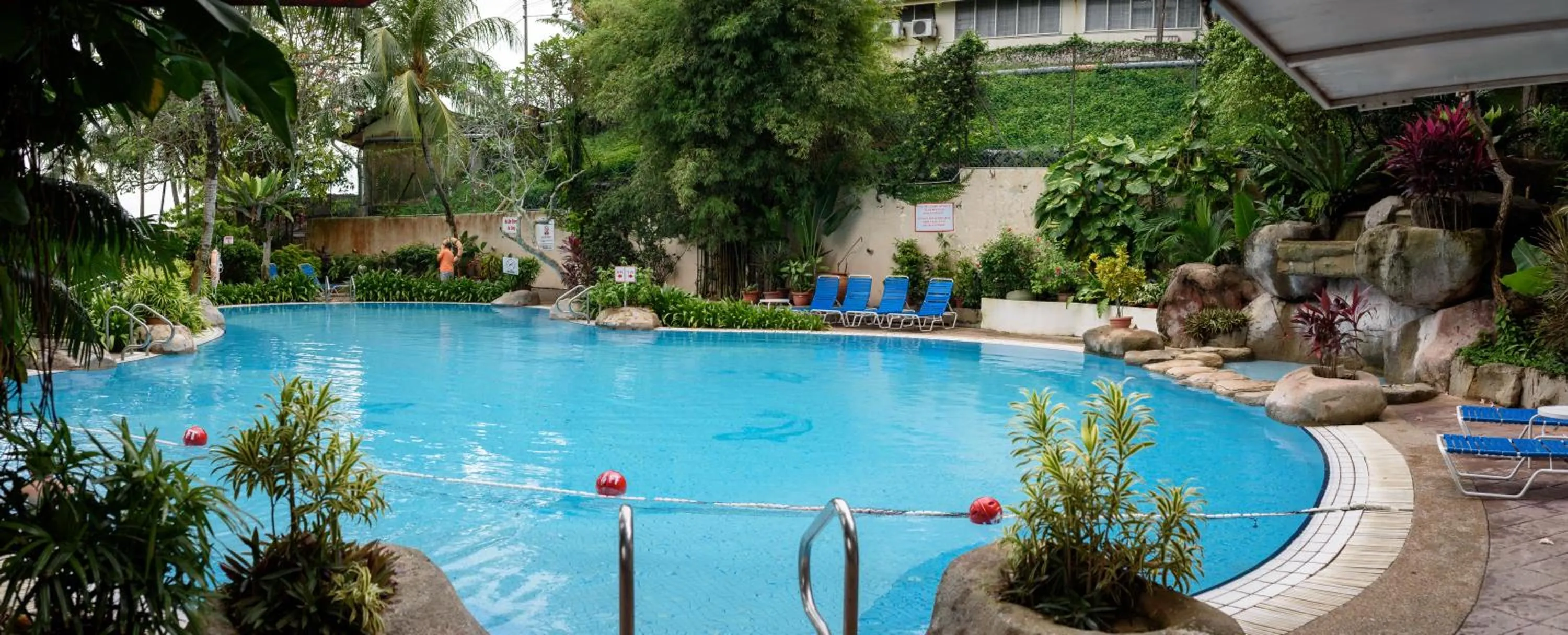 Swimming pool in J Beach Suites At Rainbow Paradise
