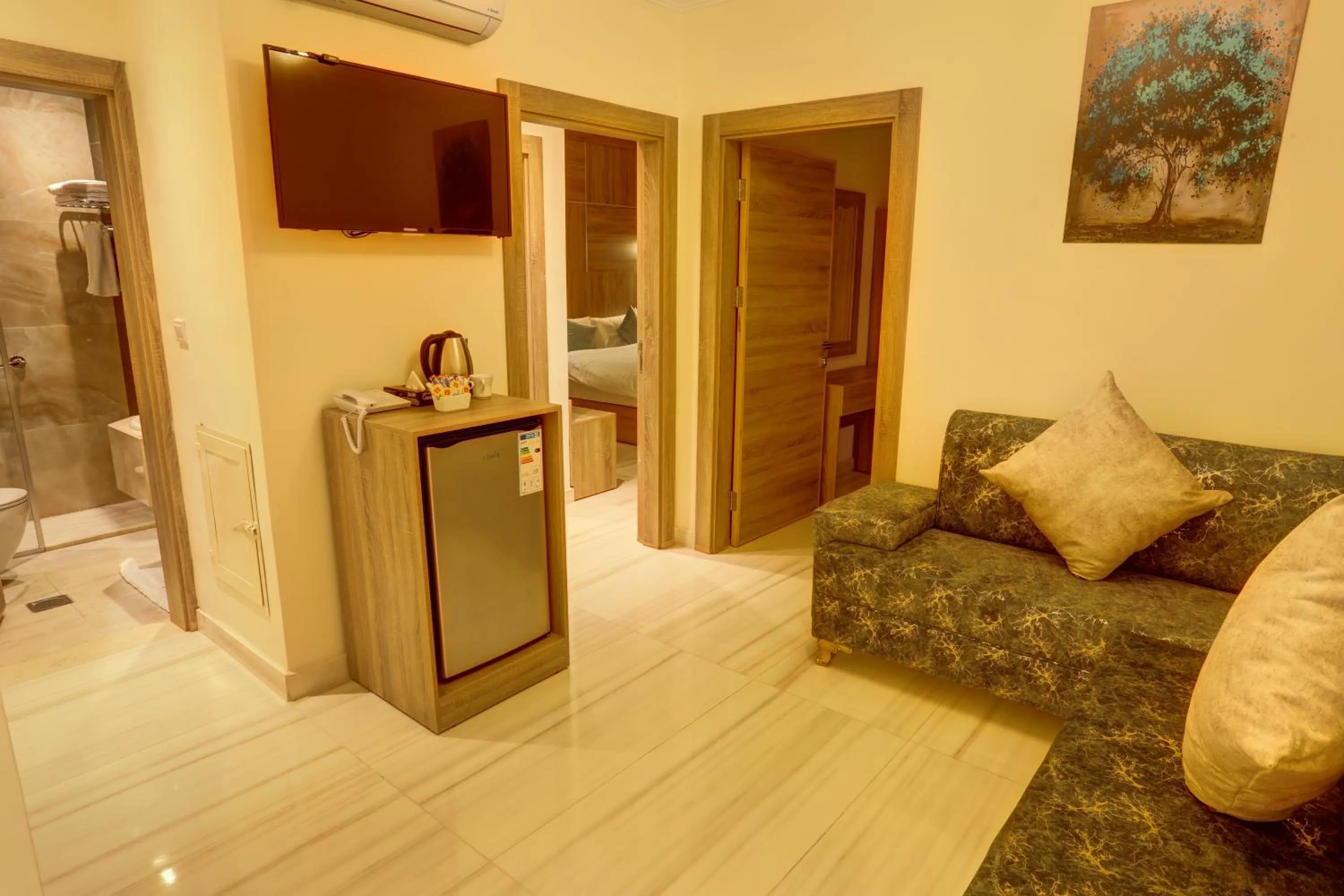 Communal lounge/ TV room, Bed in Turquoise Hotel