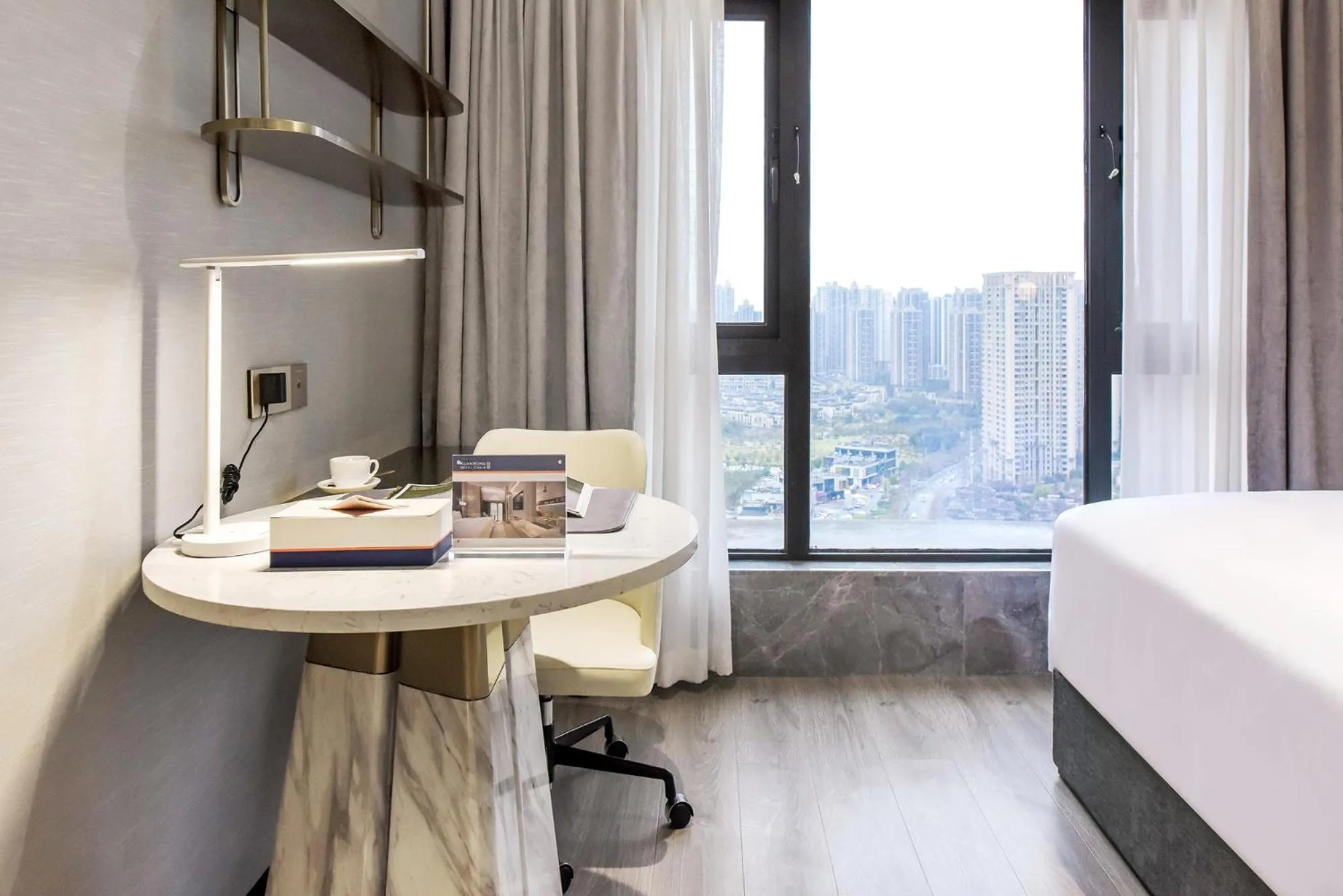 Bedroom, Bed in Kuanrong Suites Hotel Liangjiang love sea shopping park