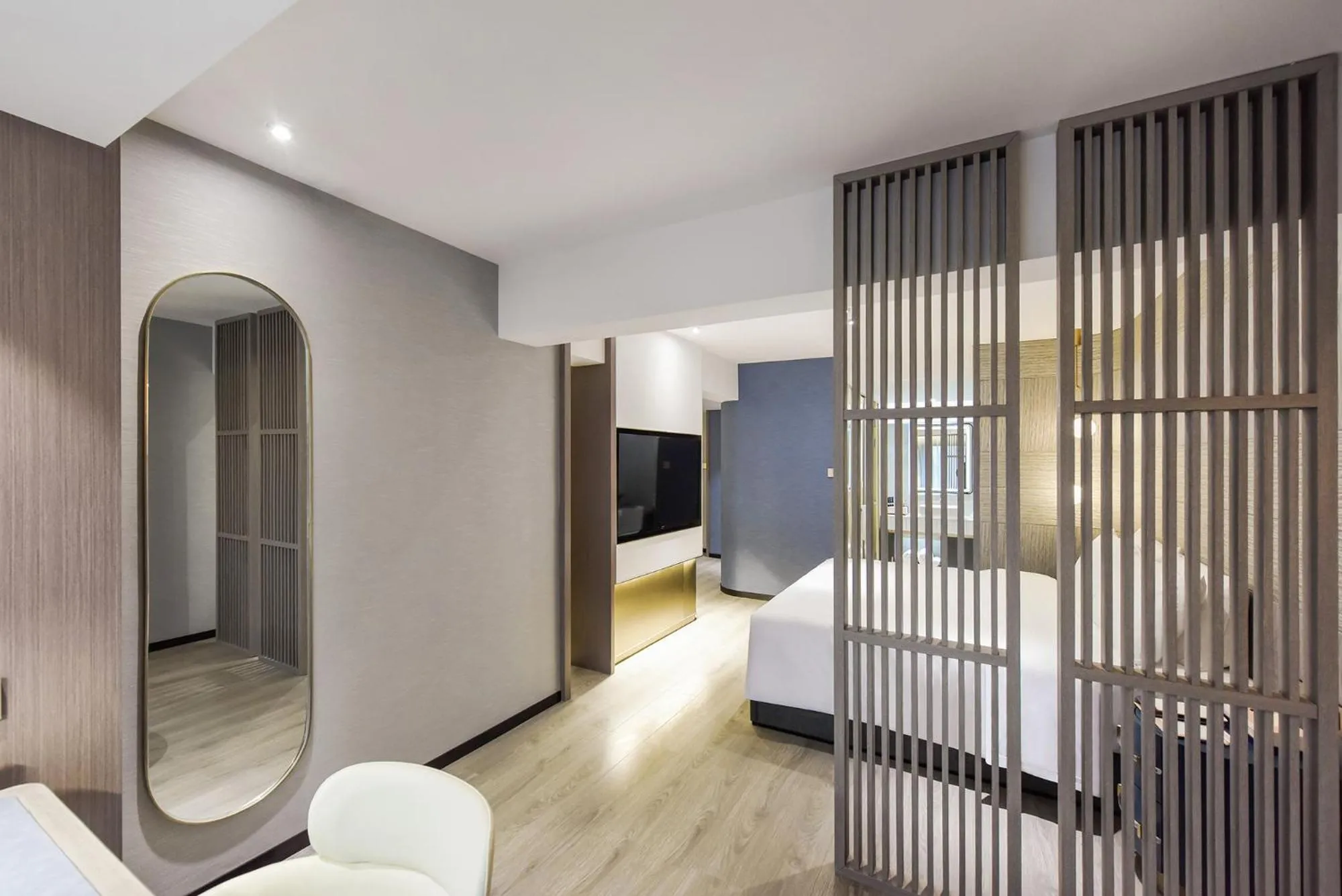 Bed in Kuanrong Suites Hotel Liangjiang love sea shopping park