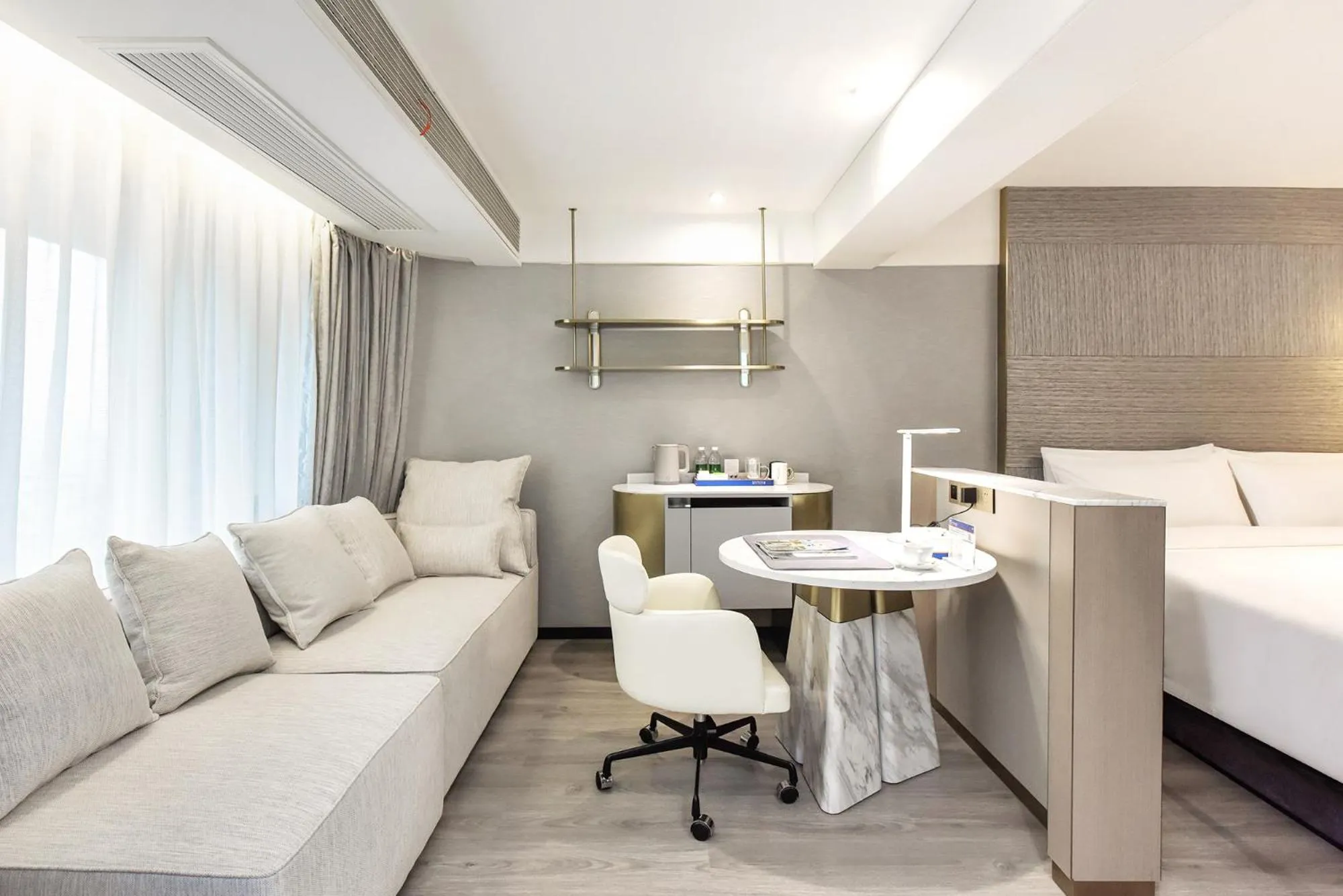 Seating area in Kuanrong Suites Hotel Liangjiang love sea shopping park