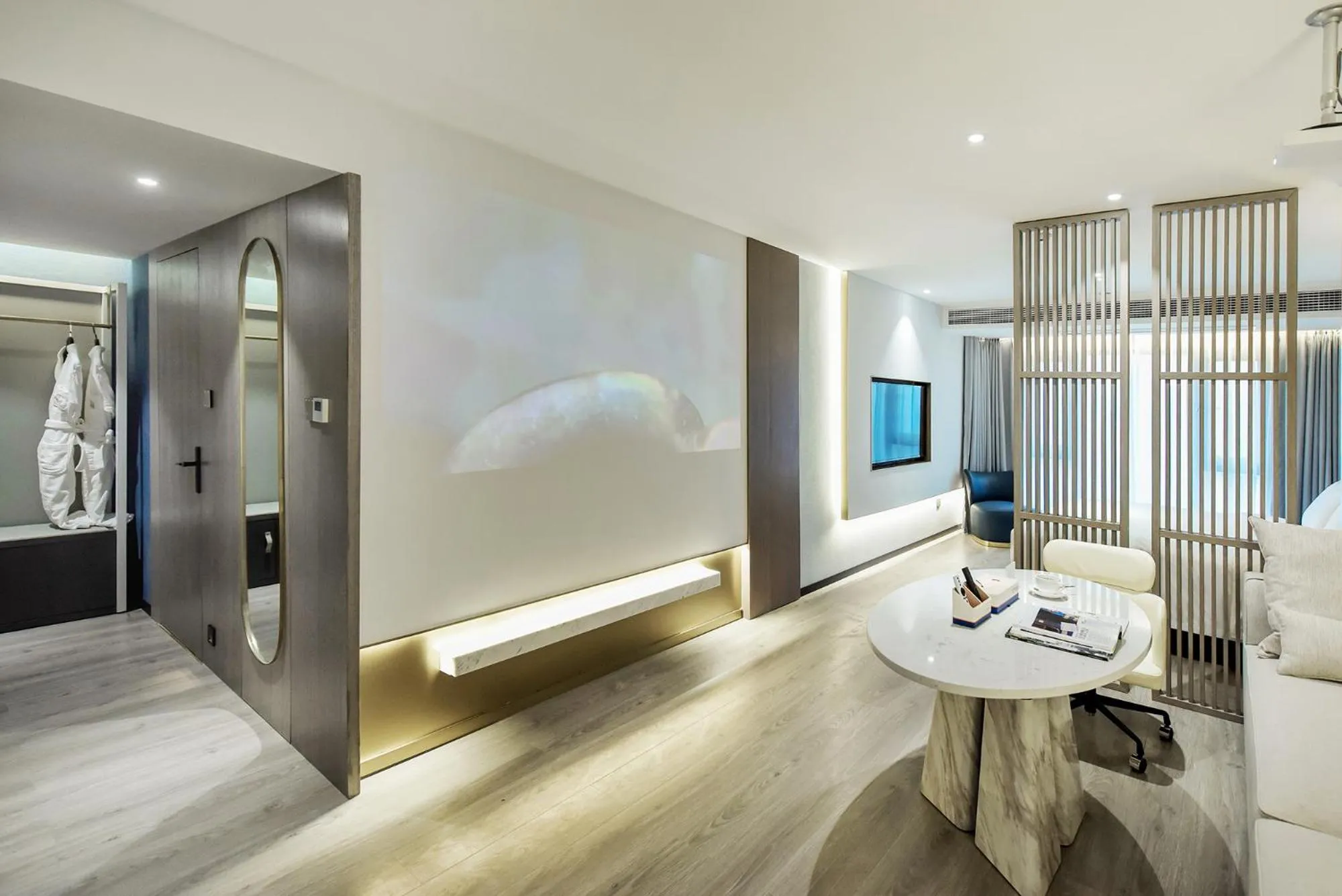 Living room, Bed in Kuanrong Suites Hotel Liangjiang love sea shopping park