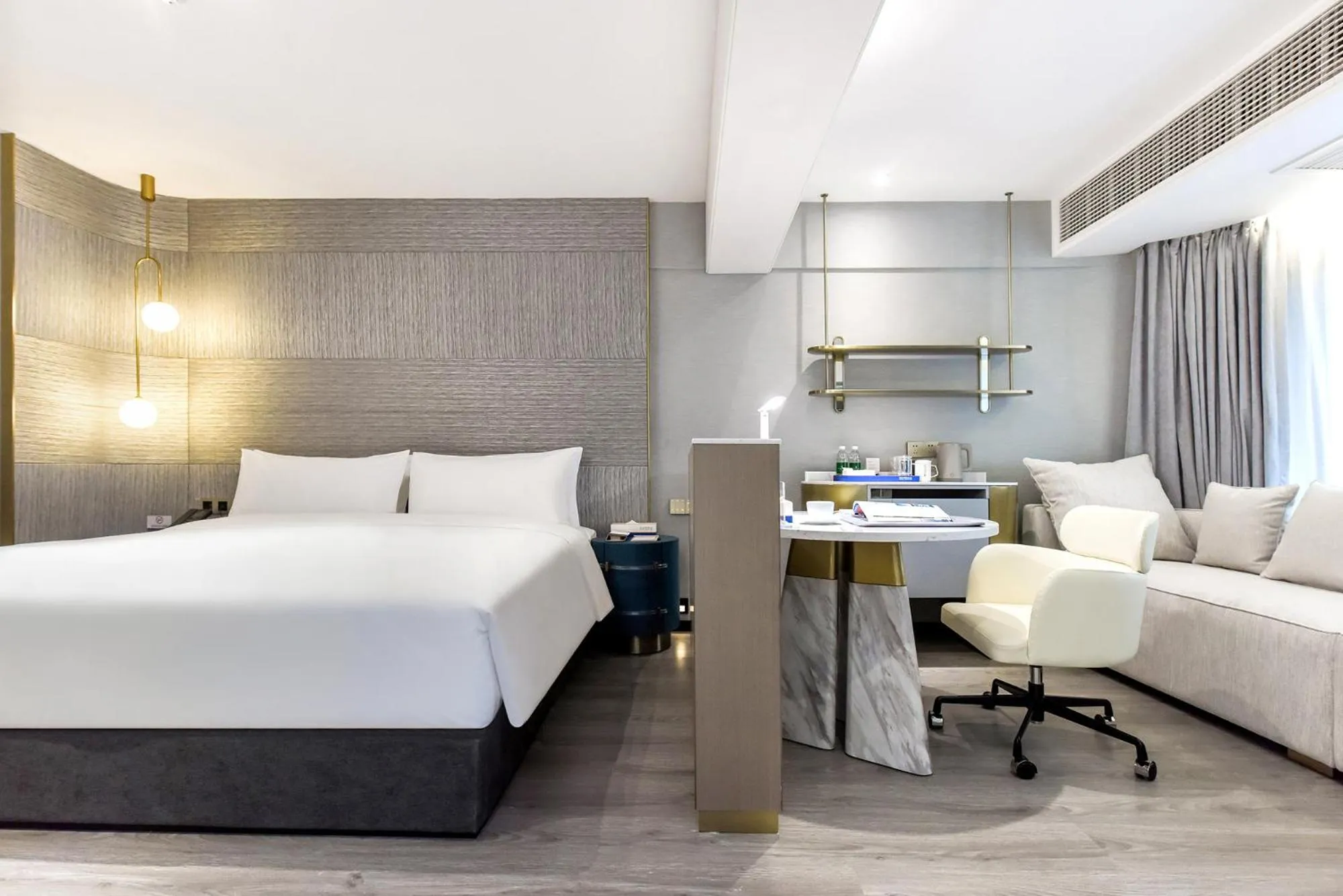 Bed in Kuanrong Suites Hotel Liangjiang love sea shopping park