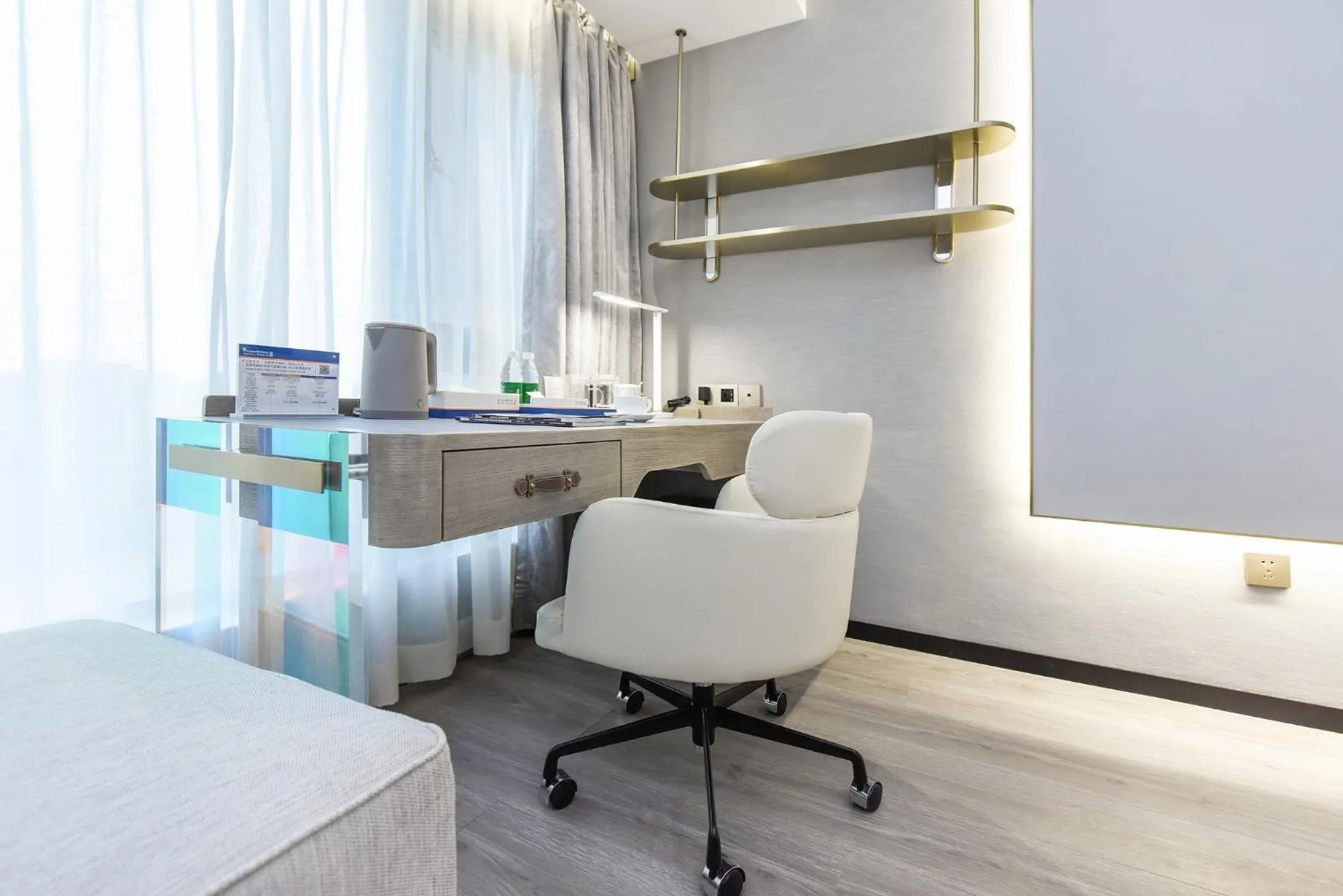 Bedroom in Kuanrong Suites Hotel Liangjiang love sea shopping park