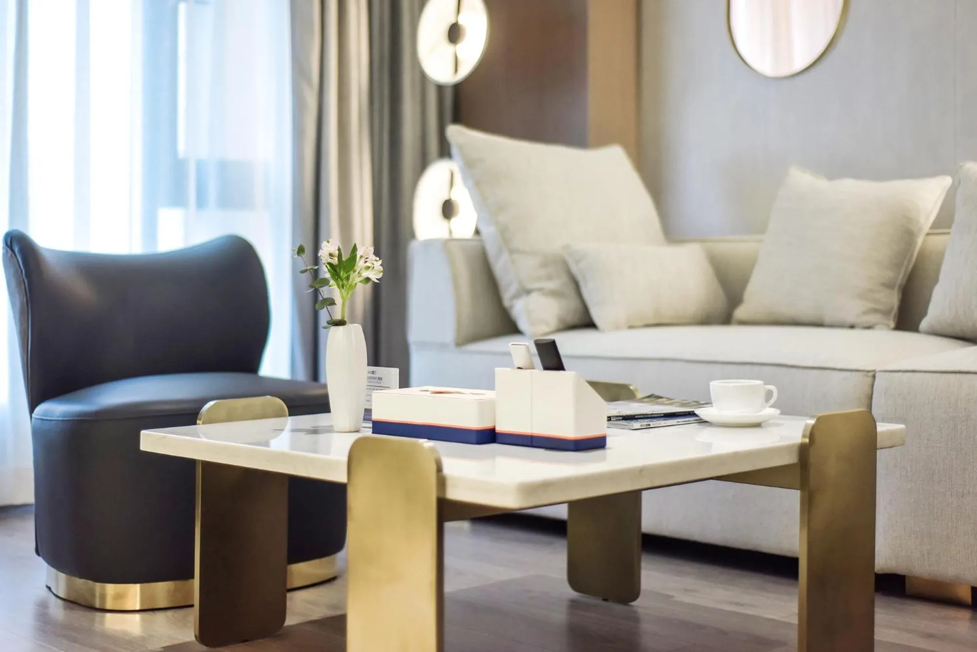 Seating area in Kuanrong Suites Hotel Liangjiang love sea shopping park