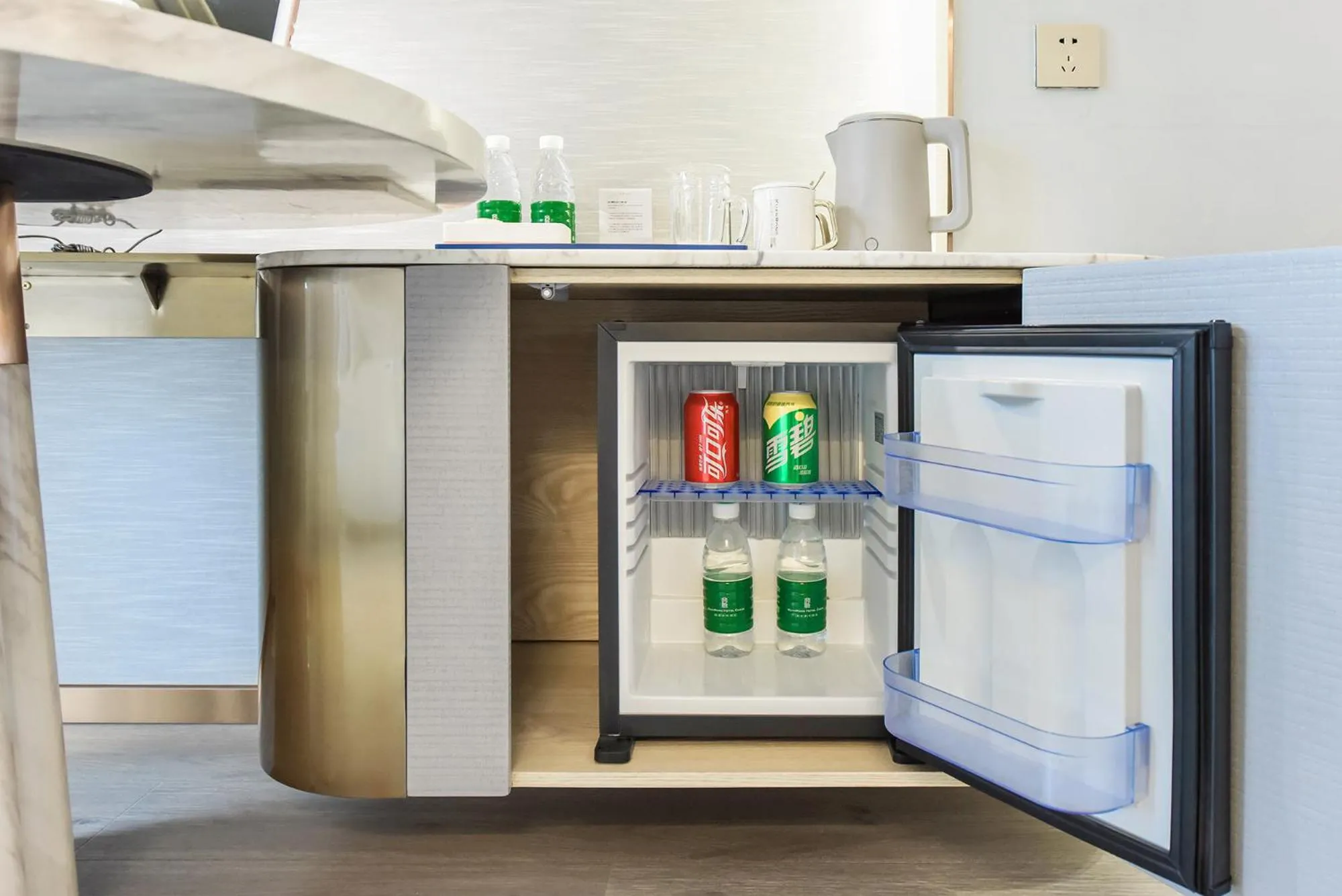 minibar in Kuanrong Suites Hotel Liangjiang love sea shopping park