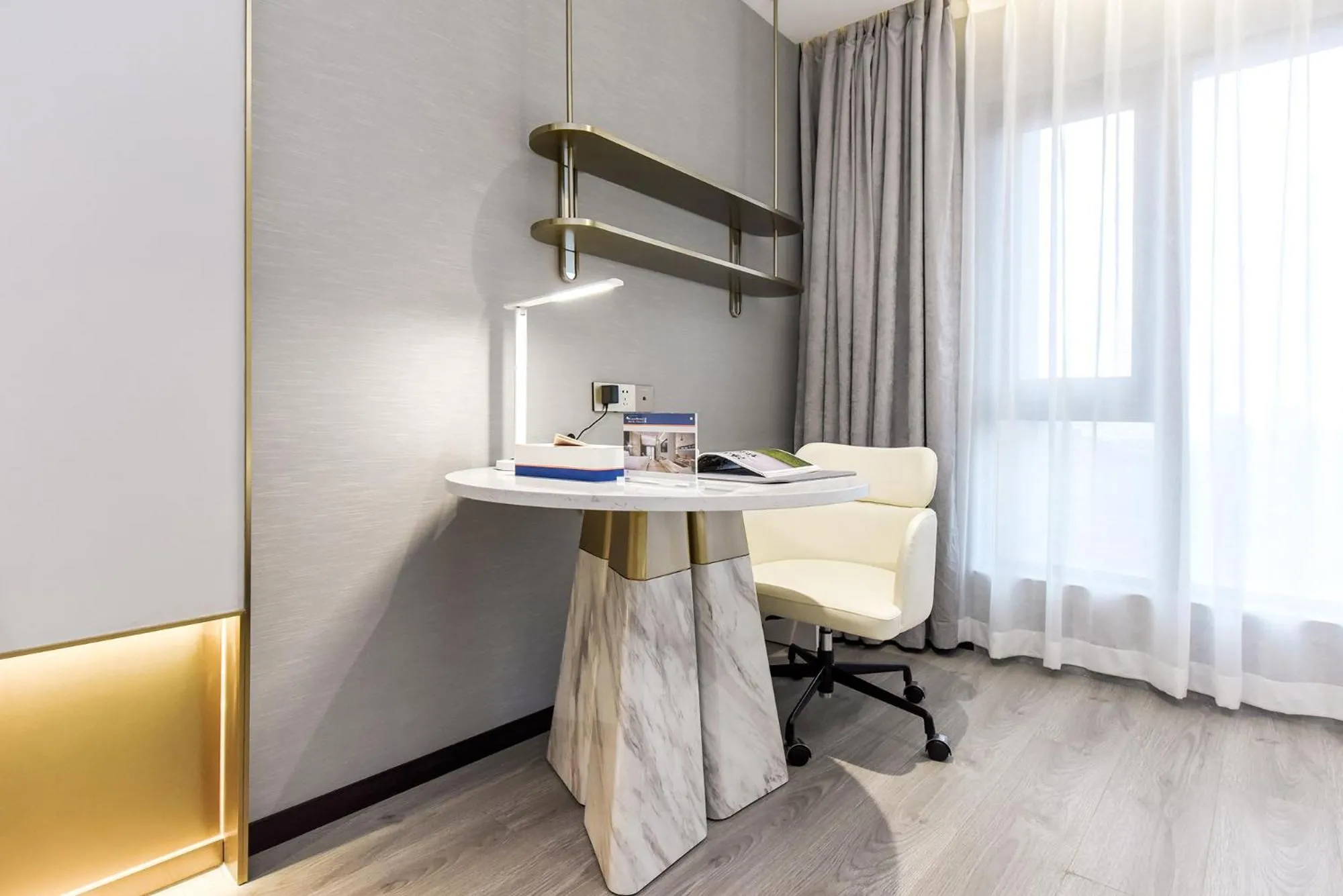 Seating area, Bed in Kuanrong Suites Hotel Liangjiang love sea shopping park