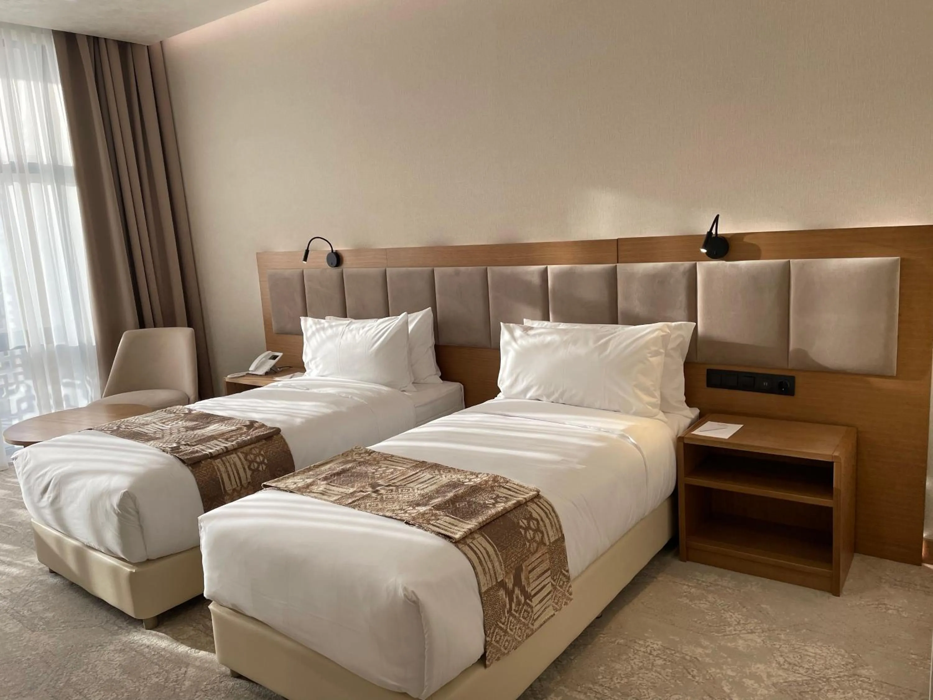 Bed in Farovon Khiva Hotel