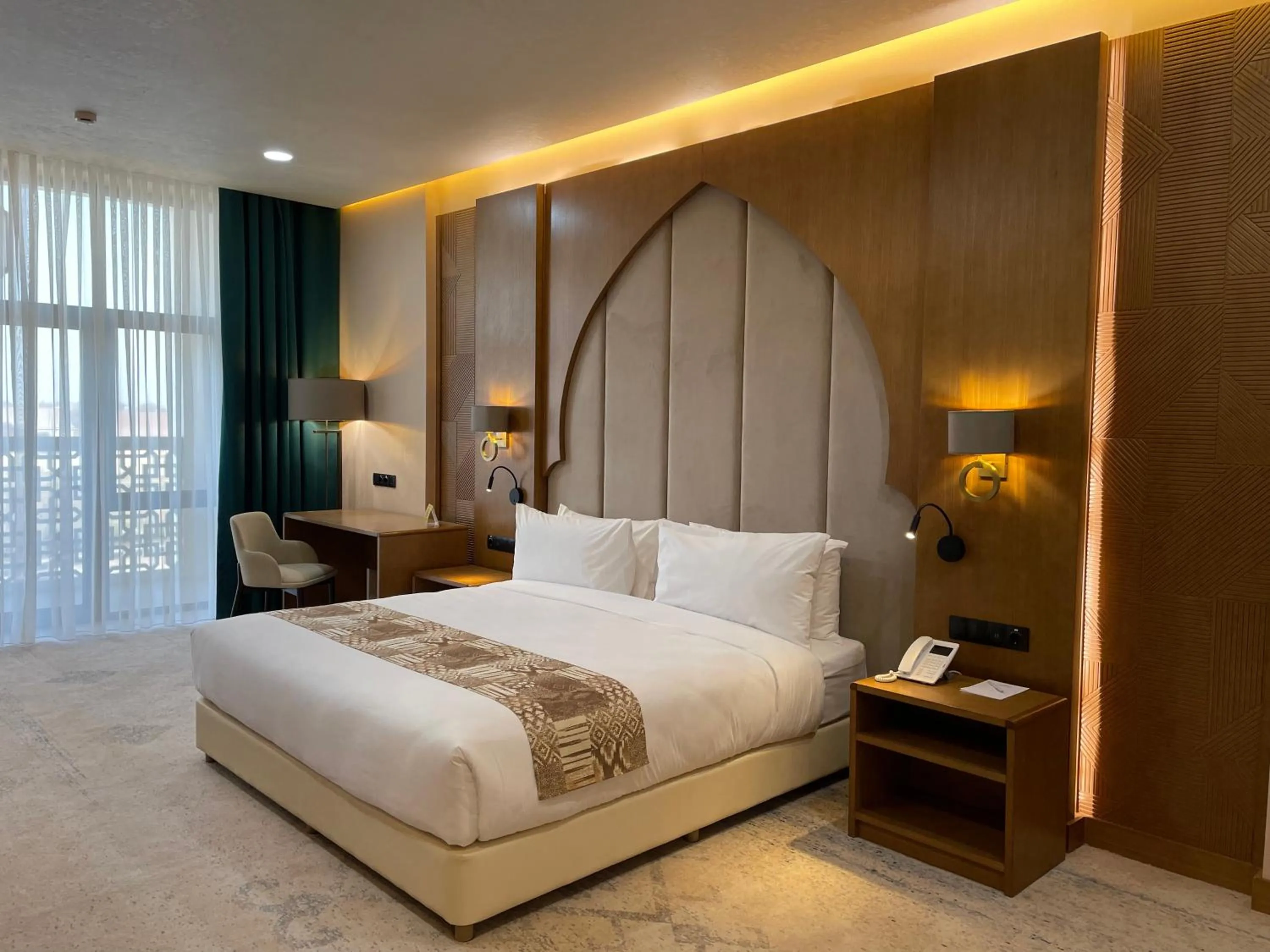 Bed in Farovon Khiva Hotel