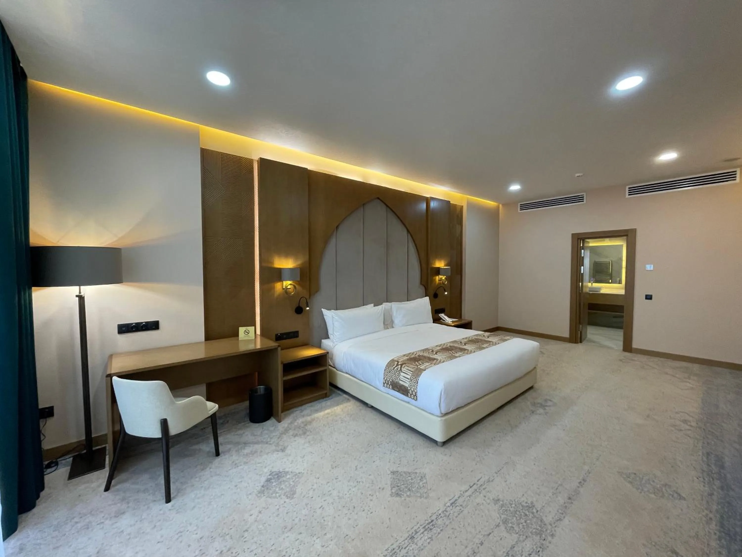 Bed in Farovon Khiva Hotel