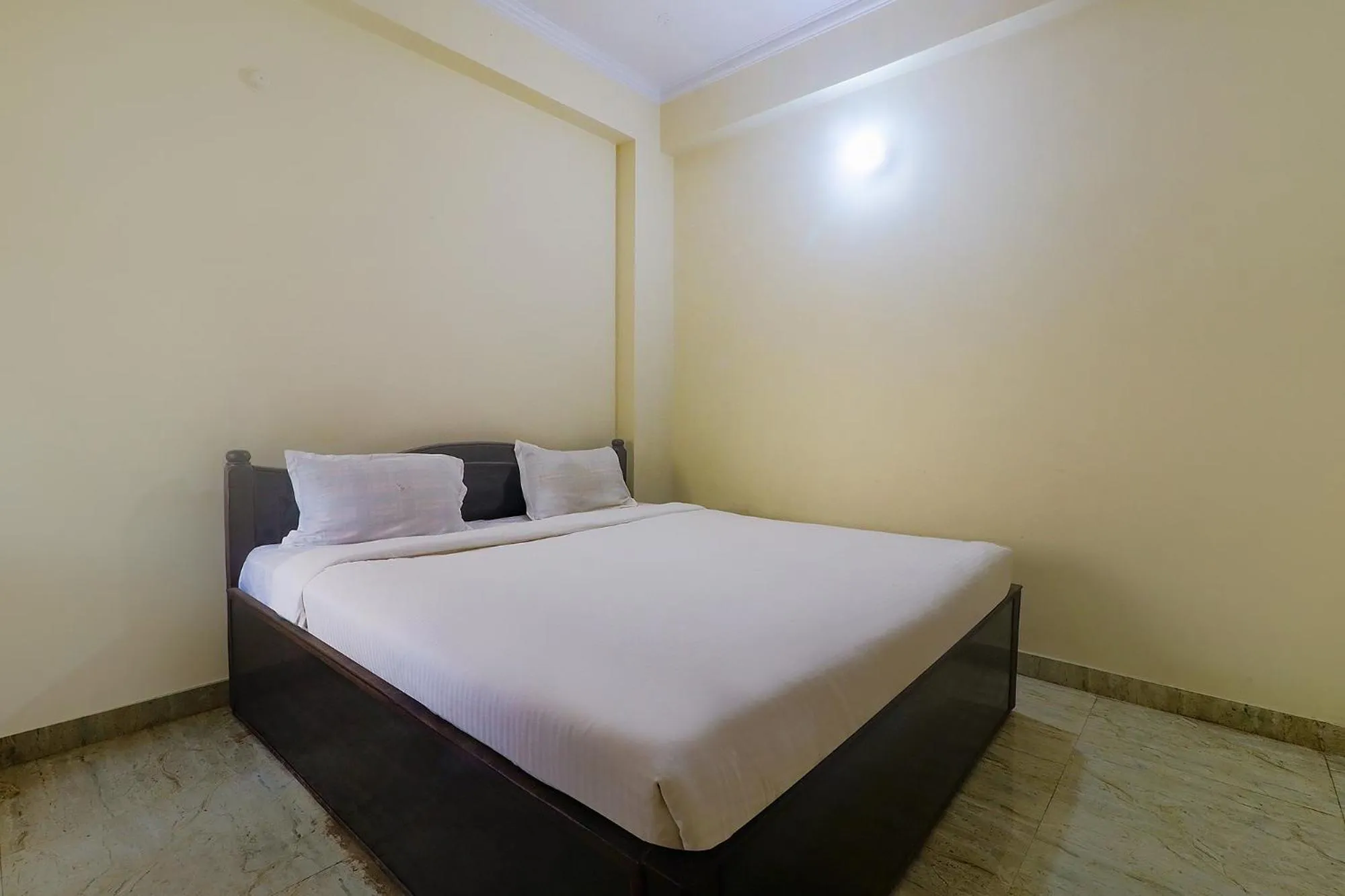 Bed in FabHotel Buddha Residency