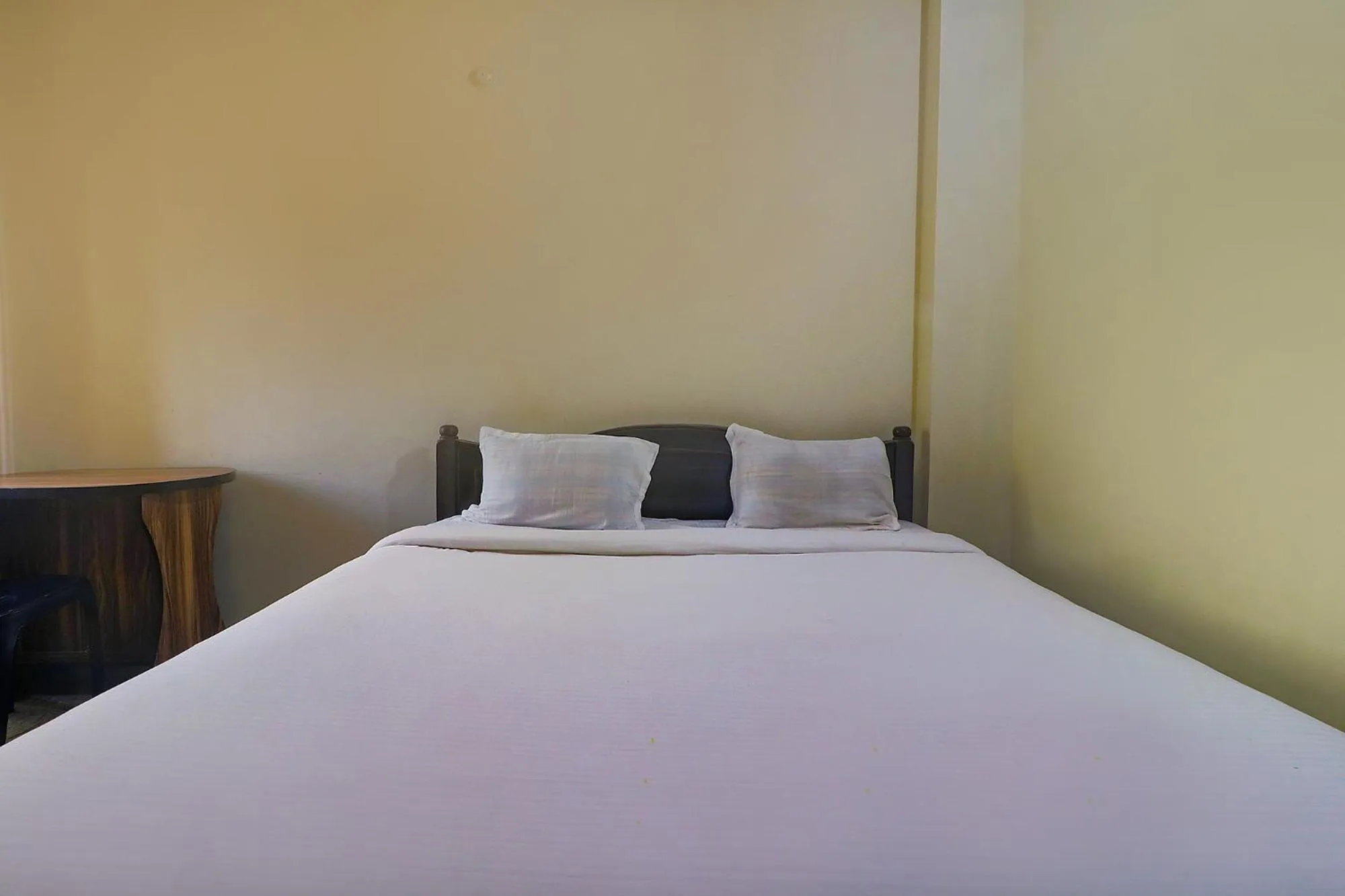 Bed in FabHotel Buddha Residency