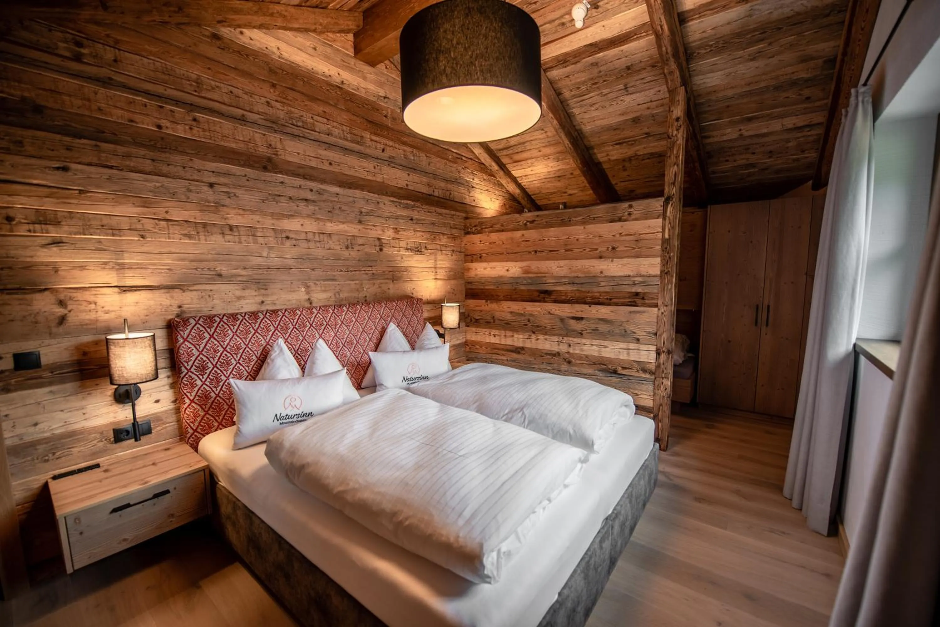 Bed in Natursinn Mountainchalets