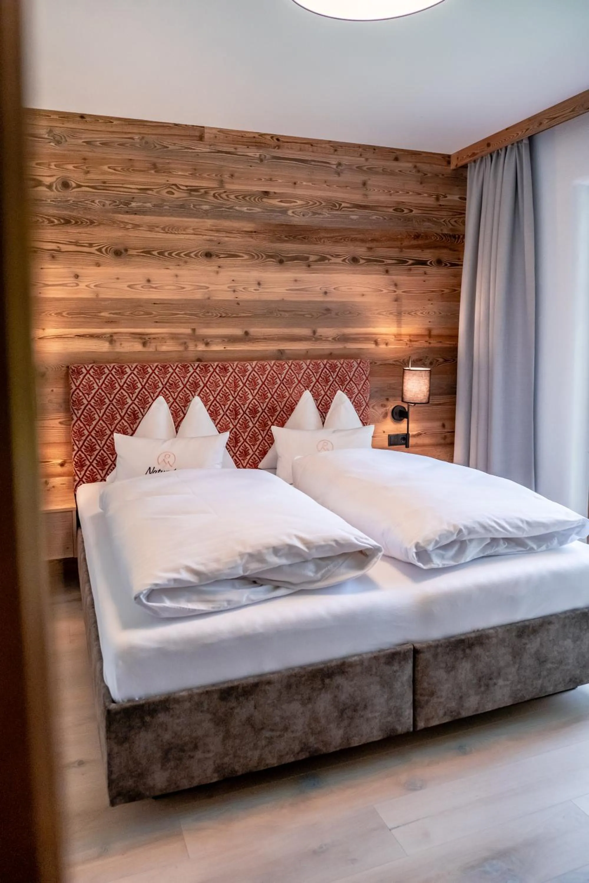 Bed in Natursinn Mountainchalets