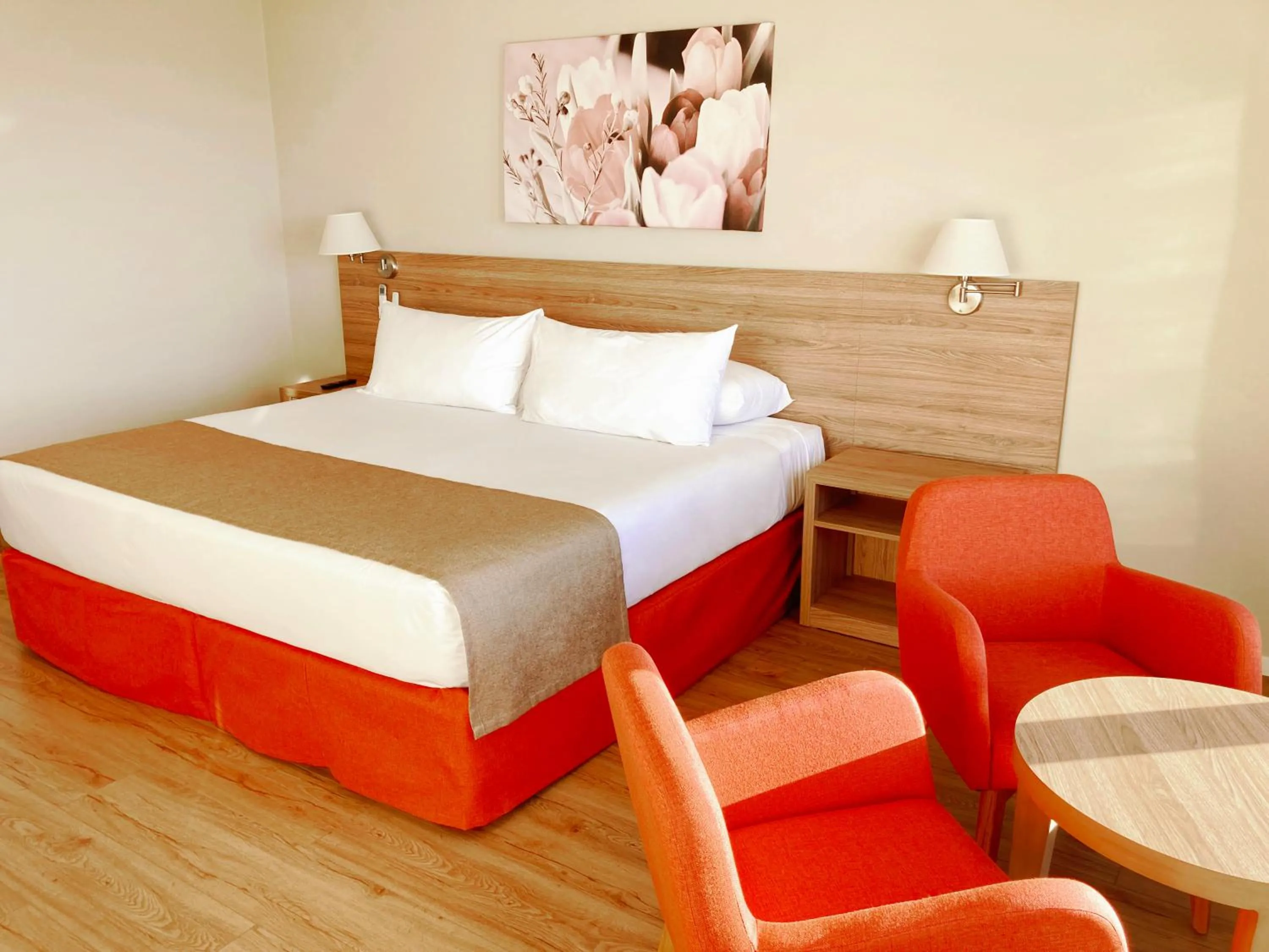 Bed in Xelena Hotel & Suites
