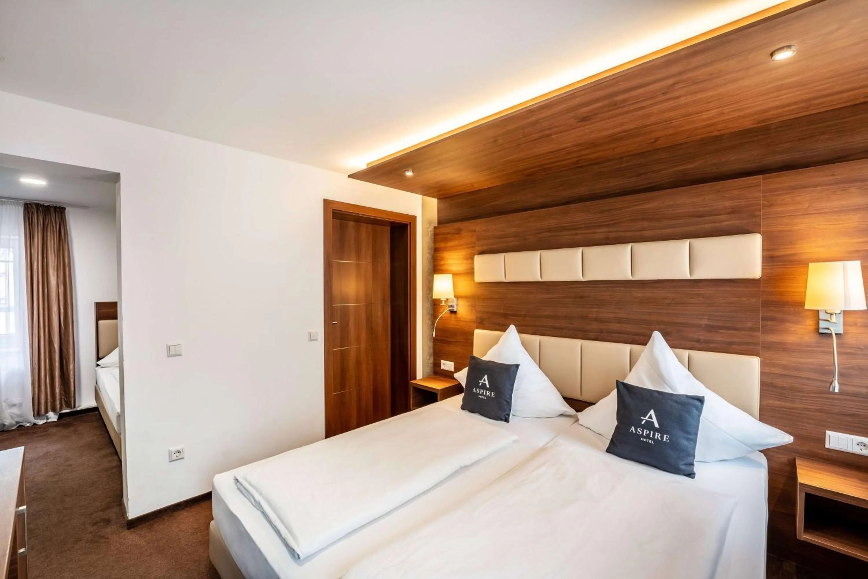 Photo of the whole room, Bed in Stadthotel Reutlingen