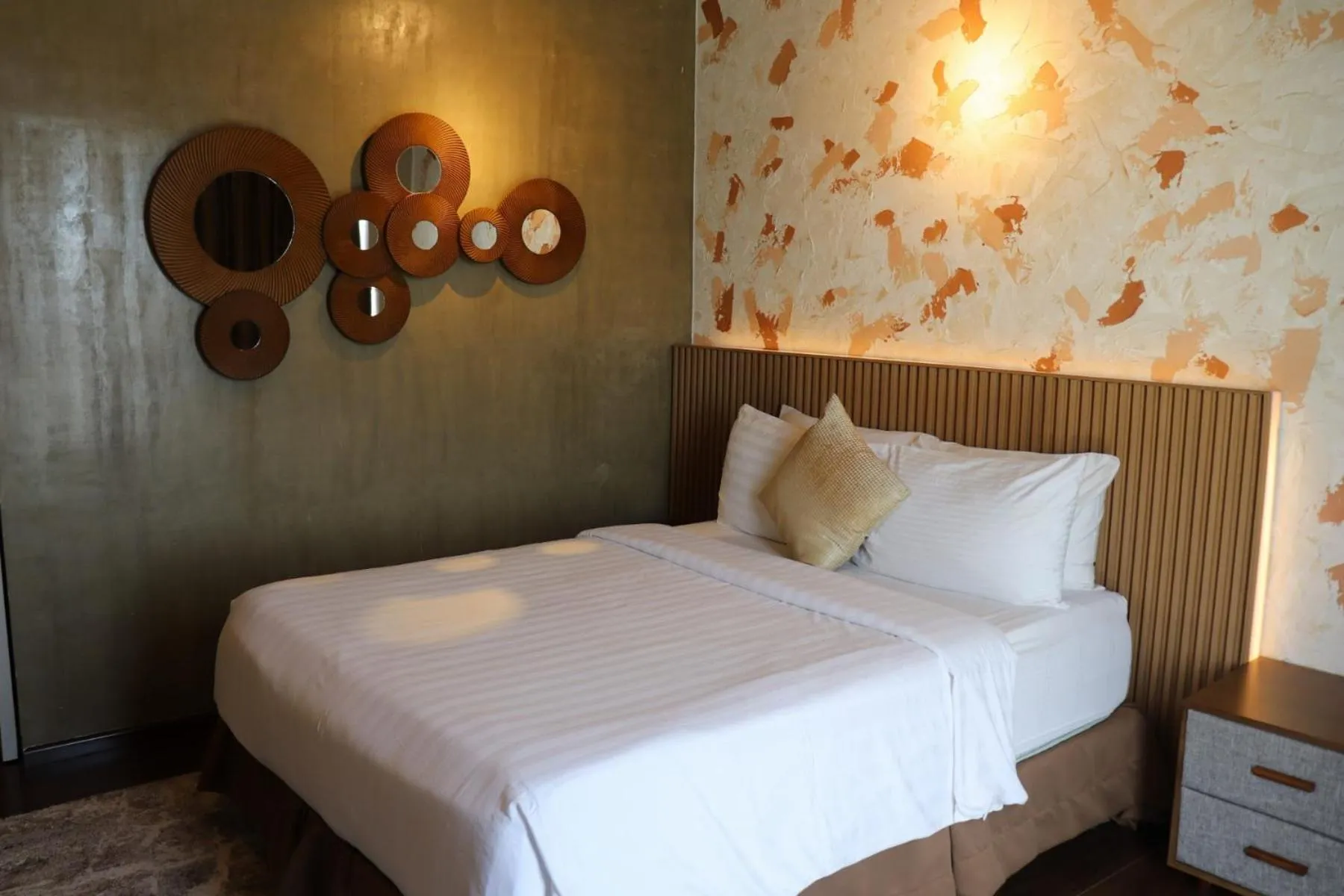 Bed in AEON SUITES Staycation