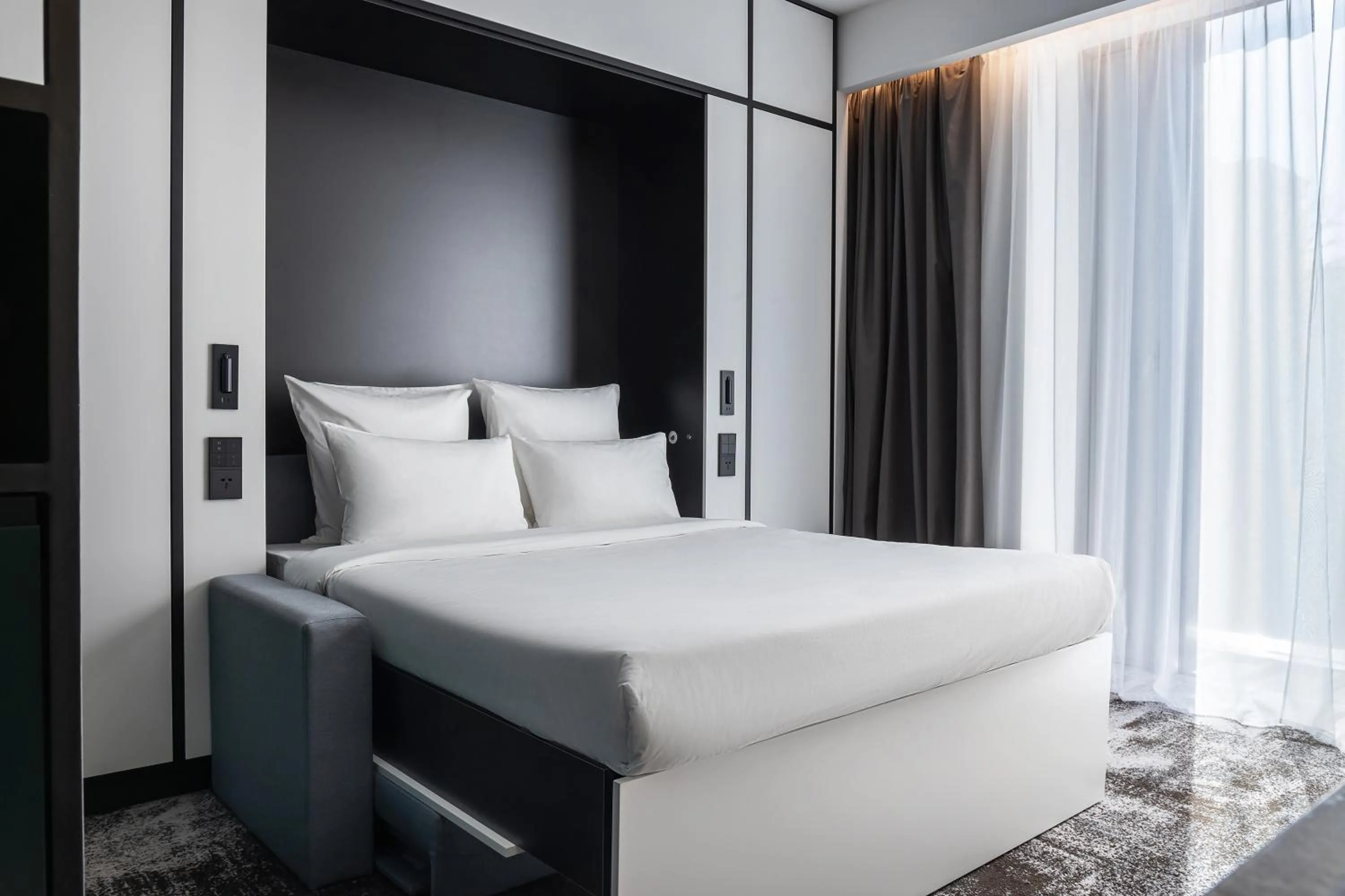 Bed in Novotel Living Almaty Jetisu