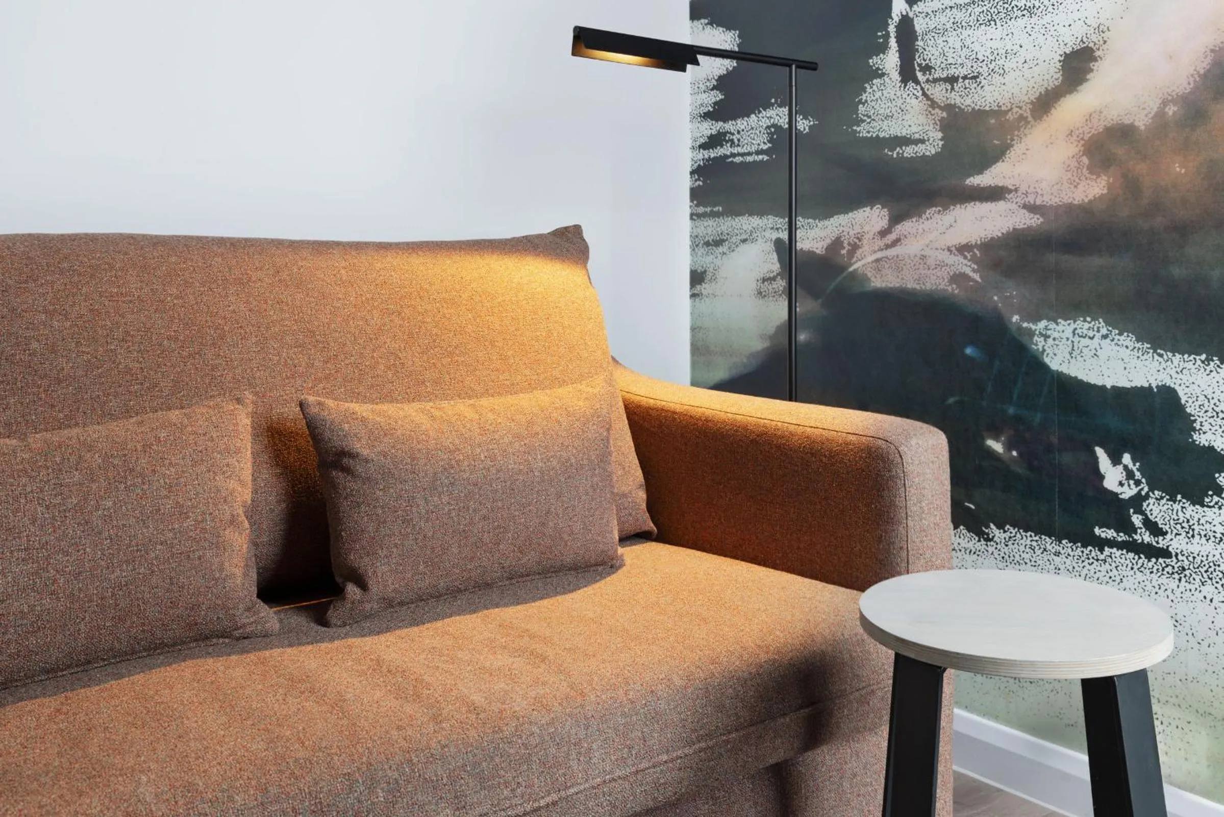 Seating area in Spark by Hilton London Romford