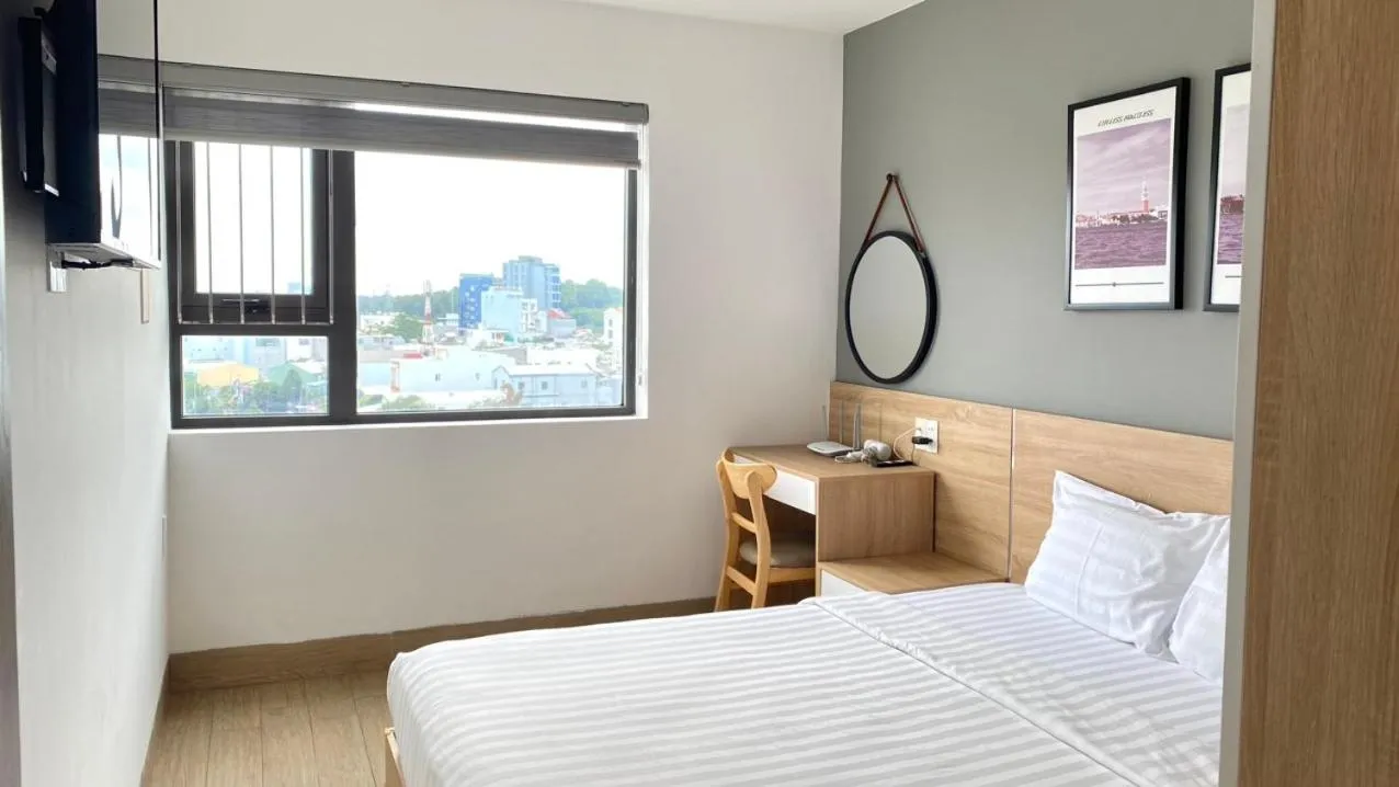 Bed in TDMAISON Hotel & Apartment