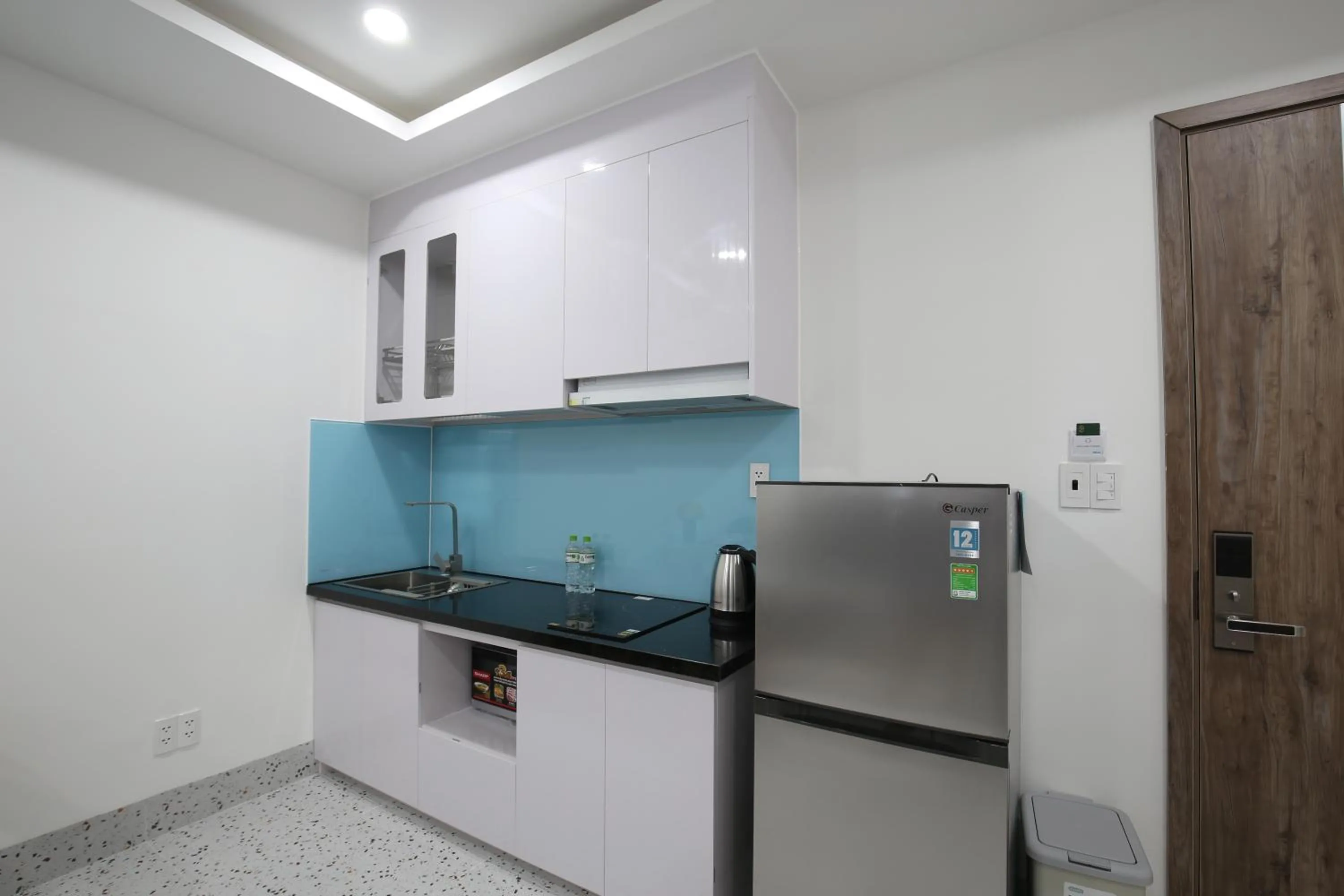 Kitchen or kitchenette in TDMAISON Hotel & Apartment