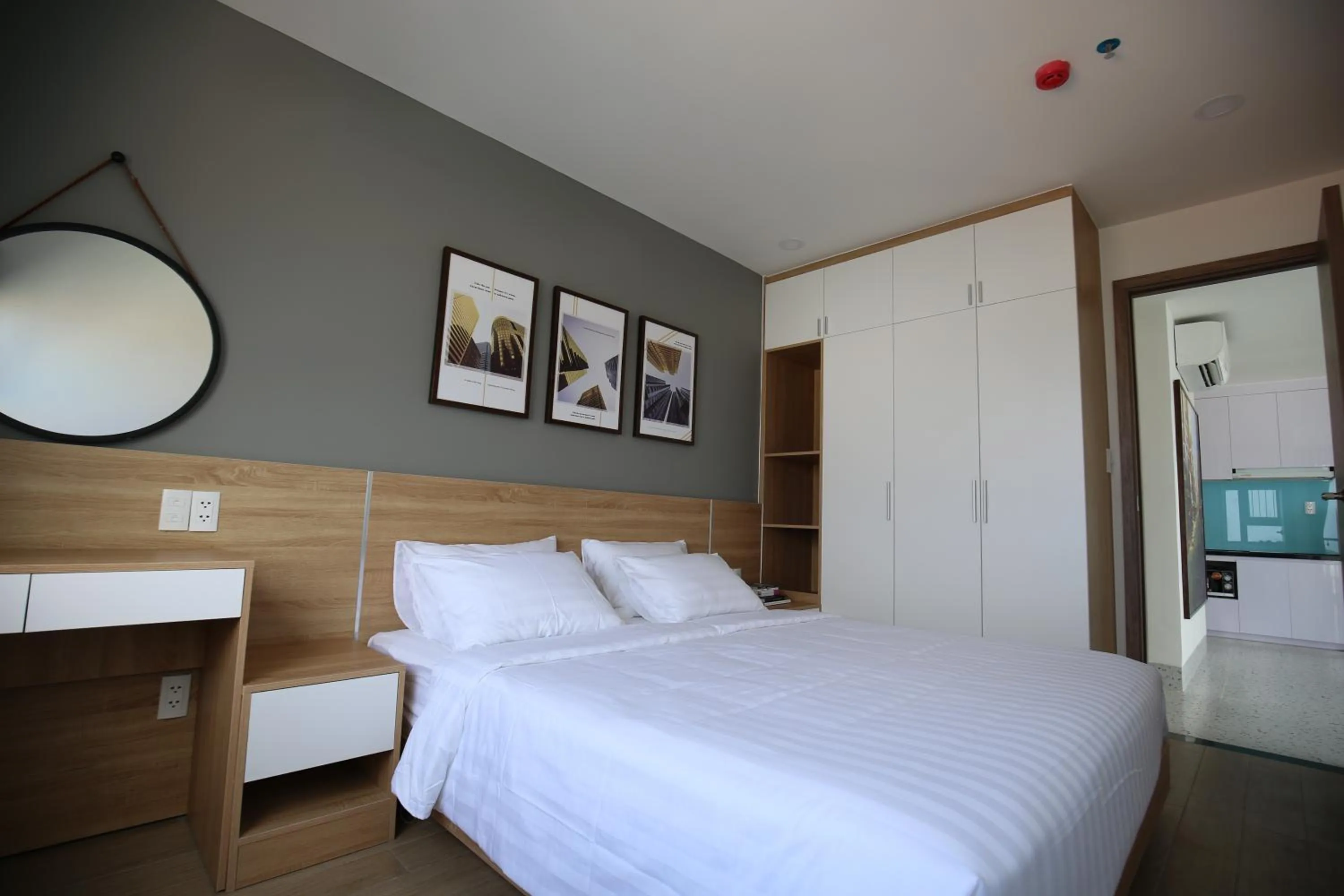 Bed in TDMAISON Hotel & Apartment