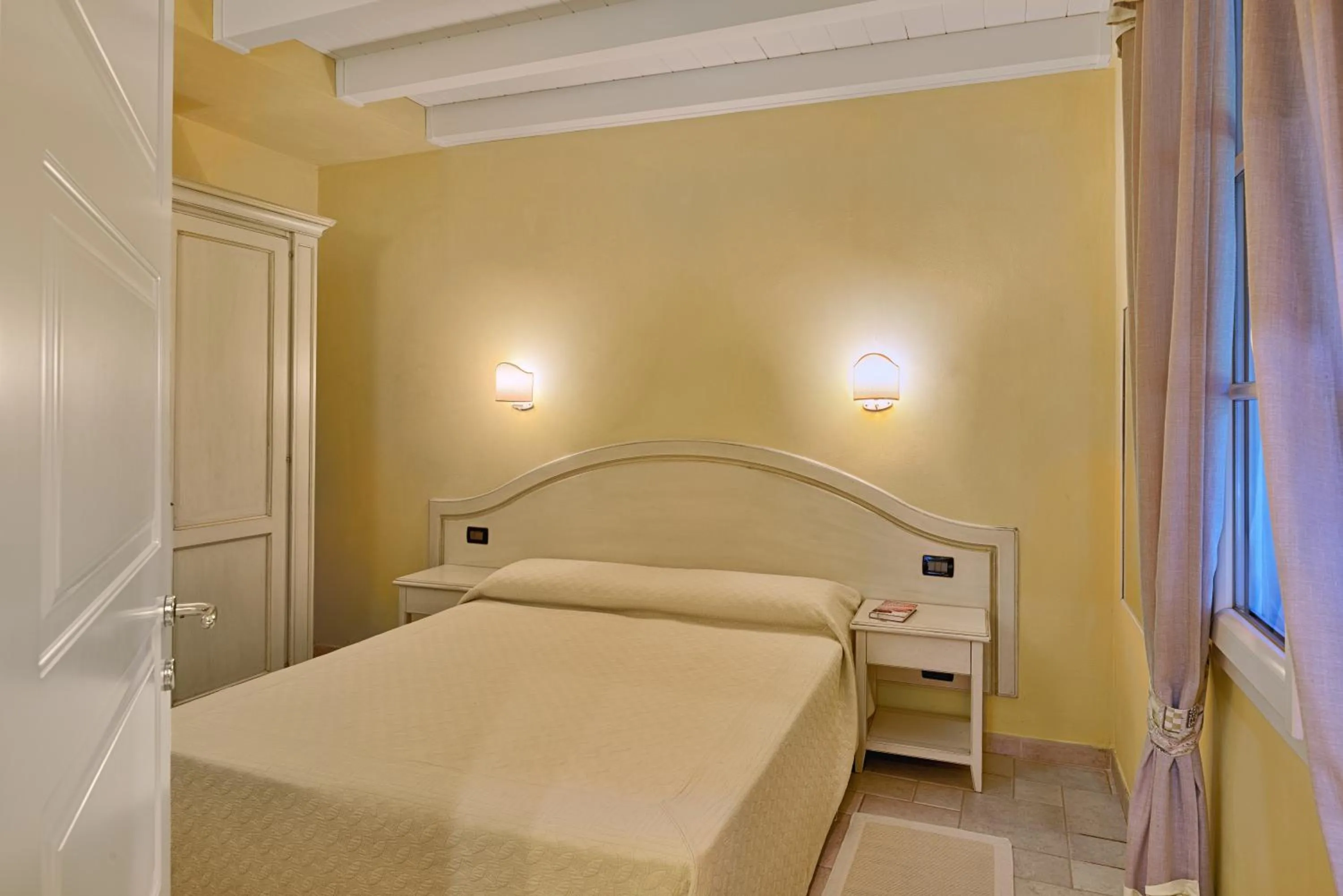 Bed in Casa Vacanze Nel Giardino di Renzo