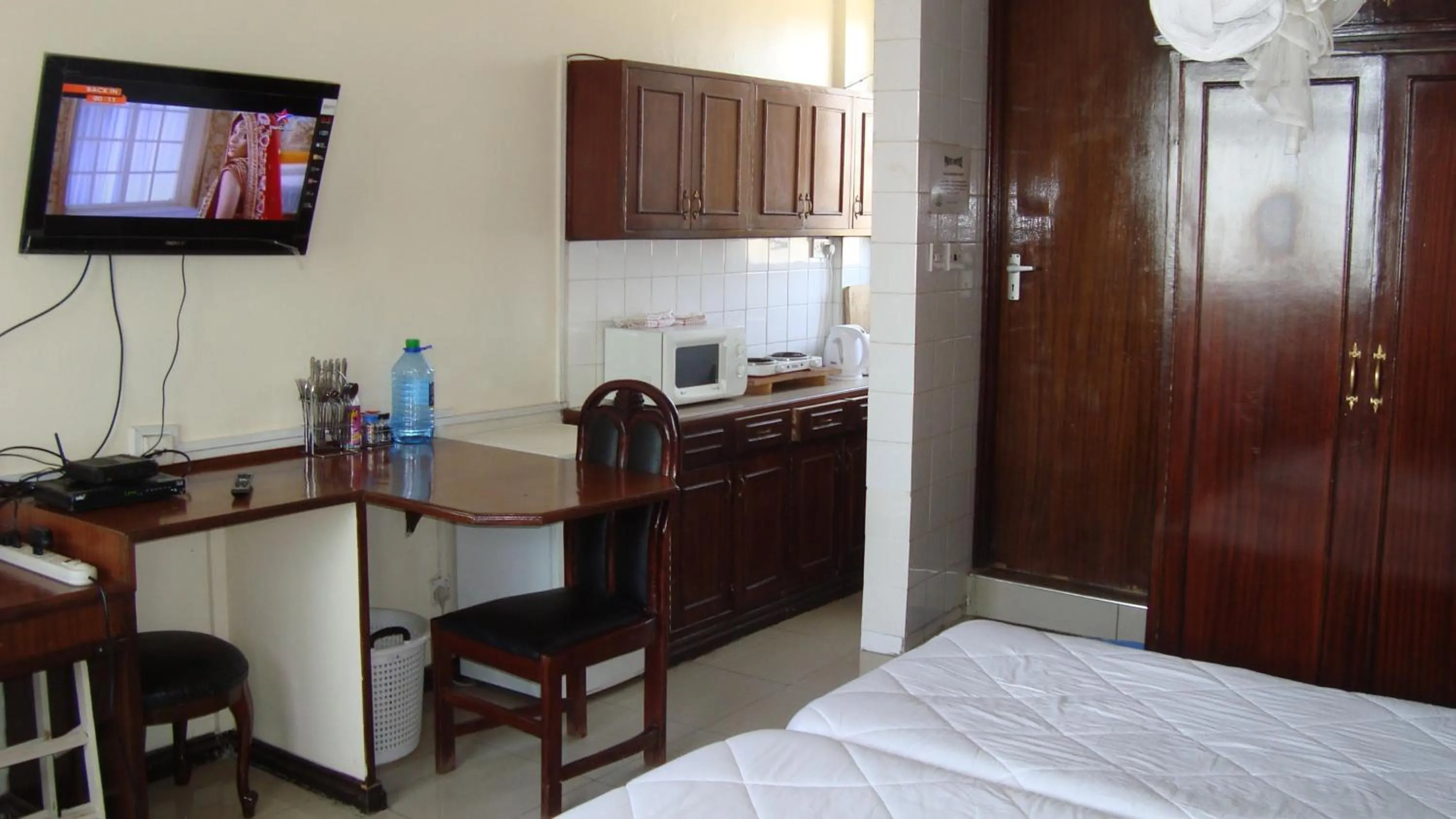 Bedroom, Bed in Diamond Plaza Apartments