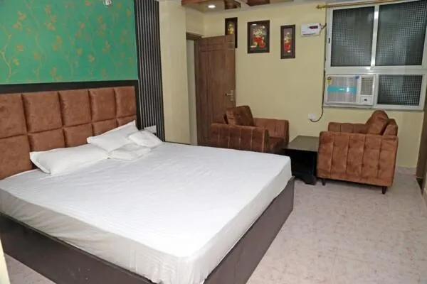 Bed in Hotel Prem Residency