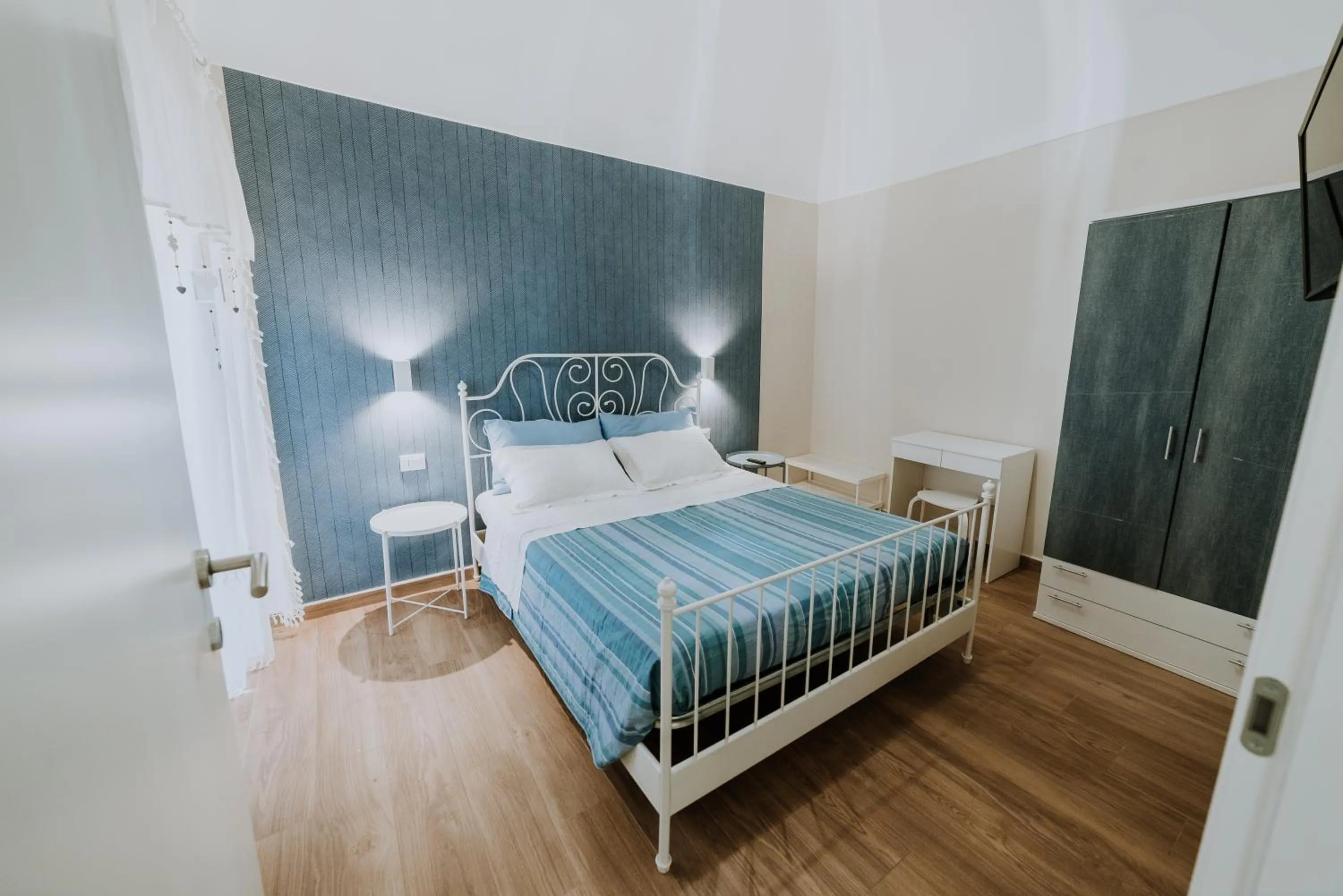 Photo of the whole room, Bed in La casa di Achille