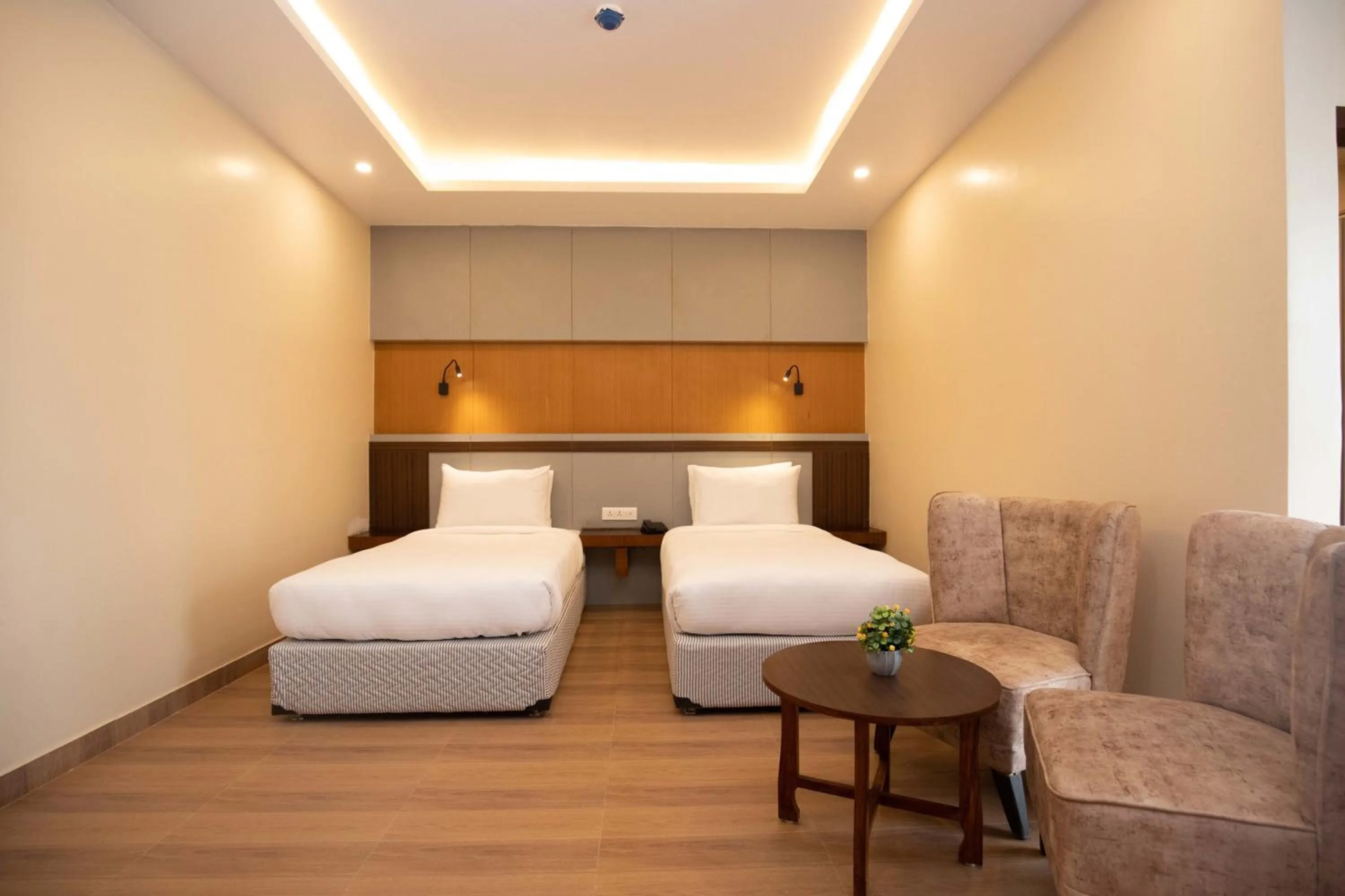 Bed in Hotel Palm International